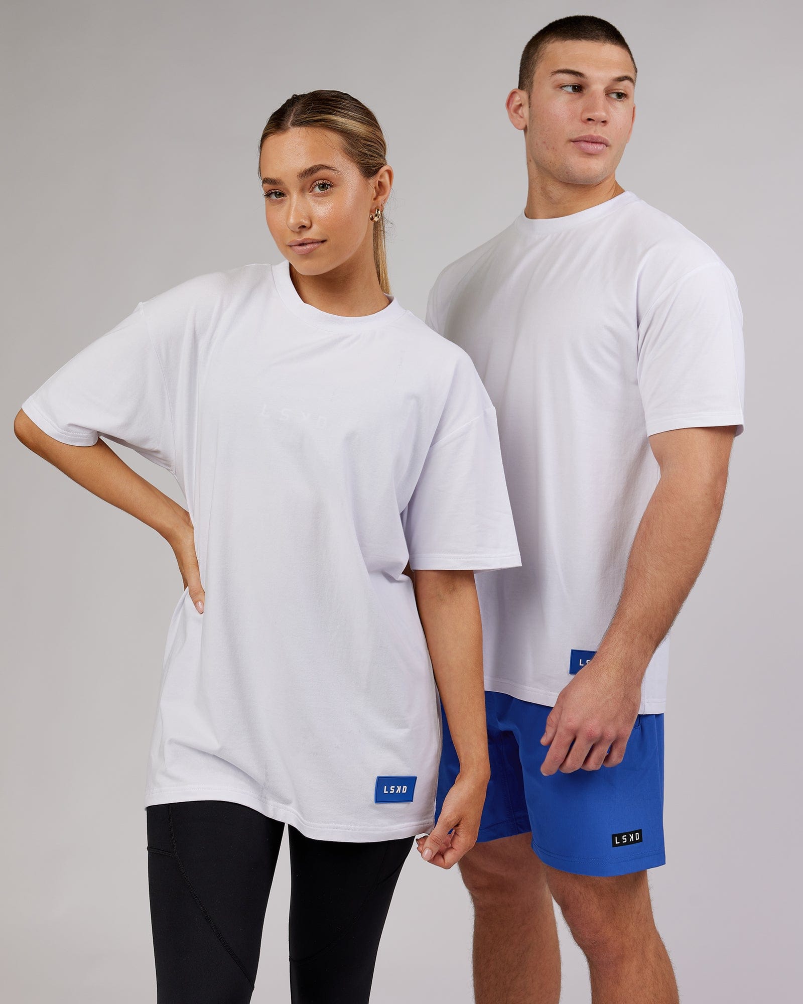 Model wearing Unisex Transfer FLXCotton Tee Oversize - White
