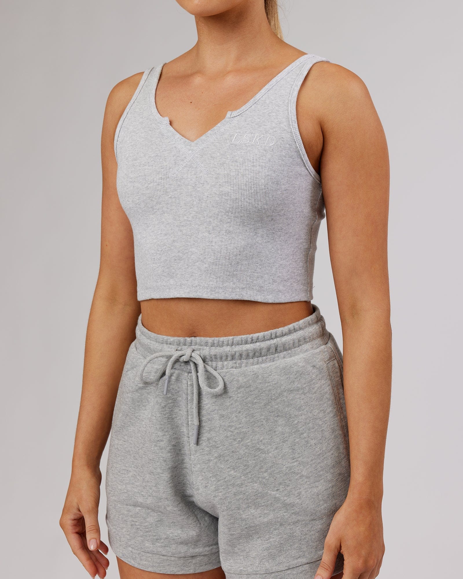 Model wearing Field Ribbed V-Neck Tank - Lt Grey Marl