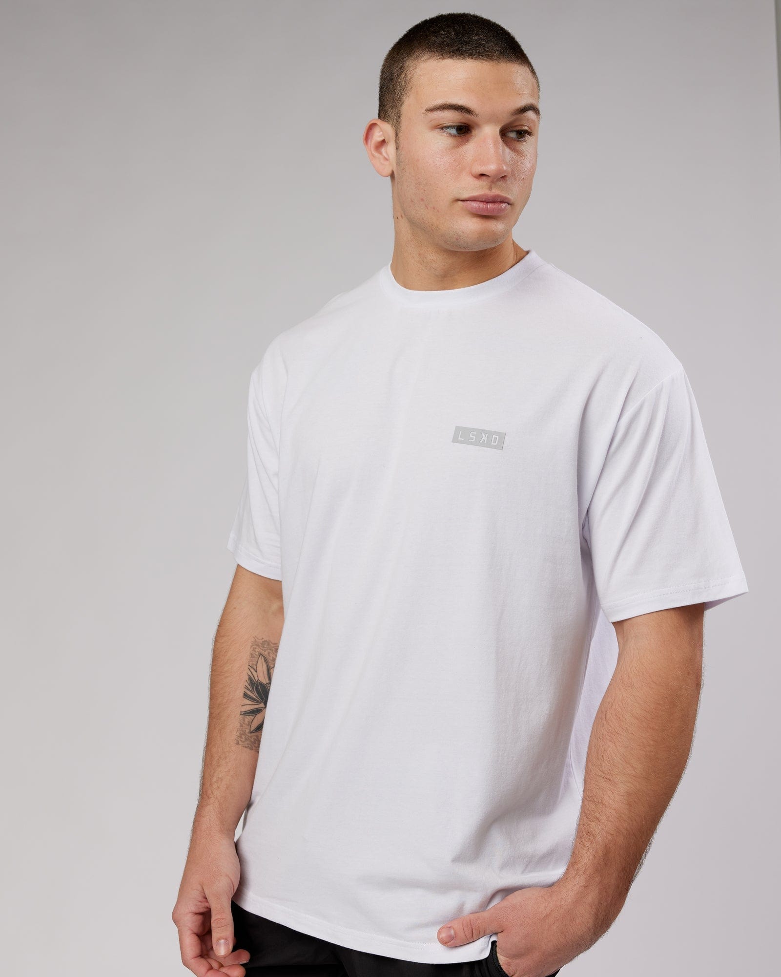 Model wearing MFBS FLXCotton Tee Oversize - White