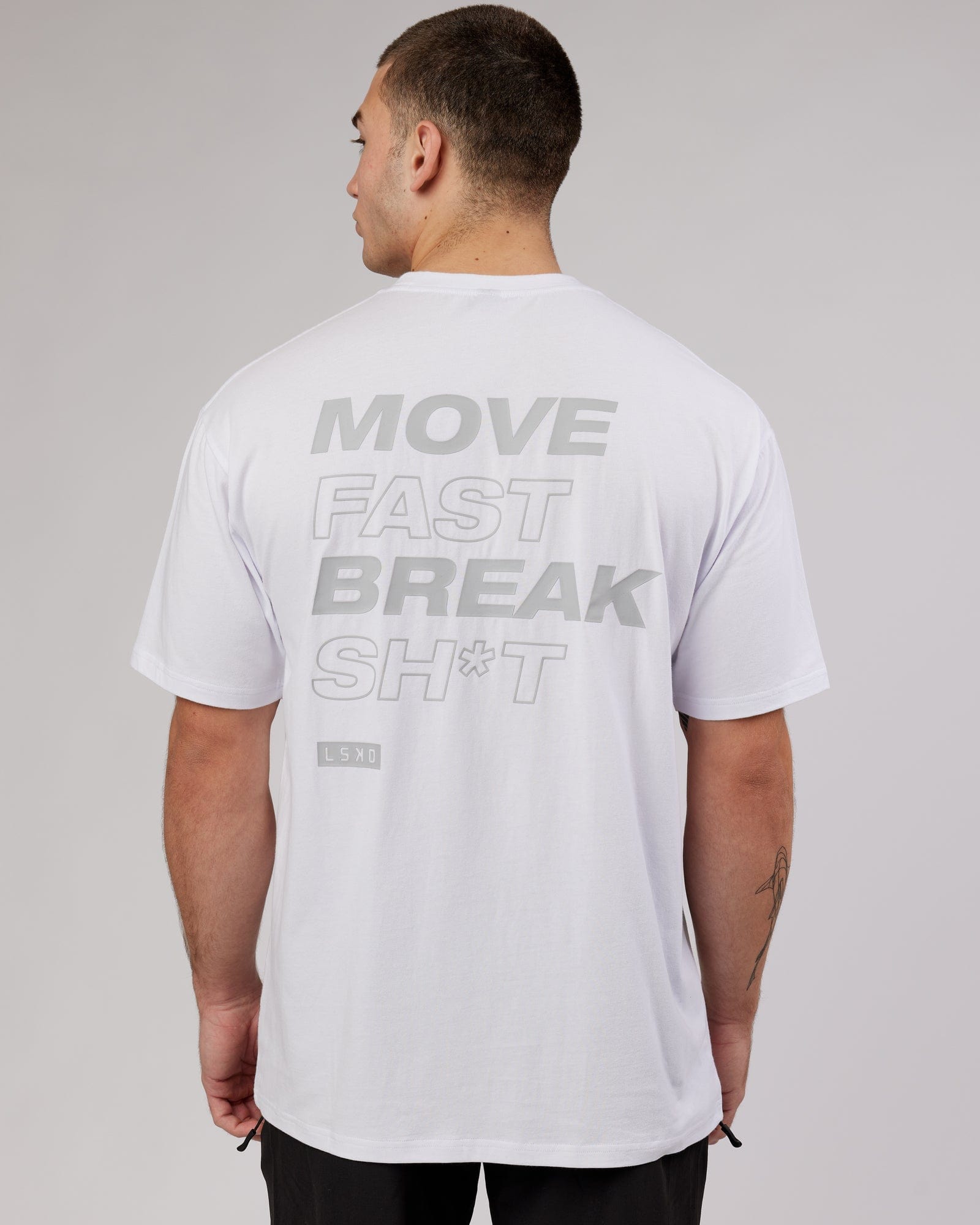 Model wearing MFBS FLXCotton Tee Oversize - White