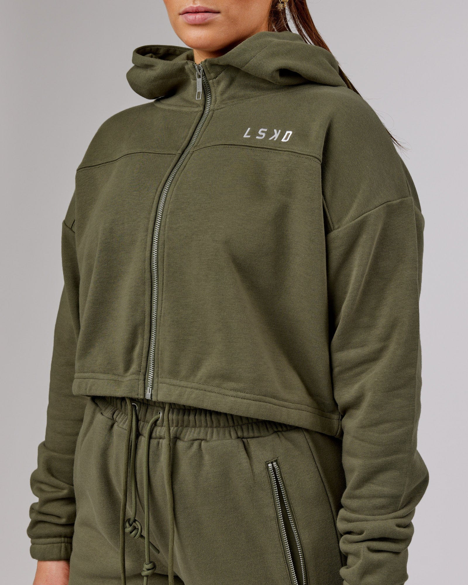 Model wearing Bridge Zip Through Hoodie - Olive Fade