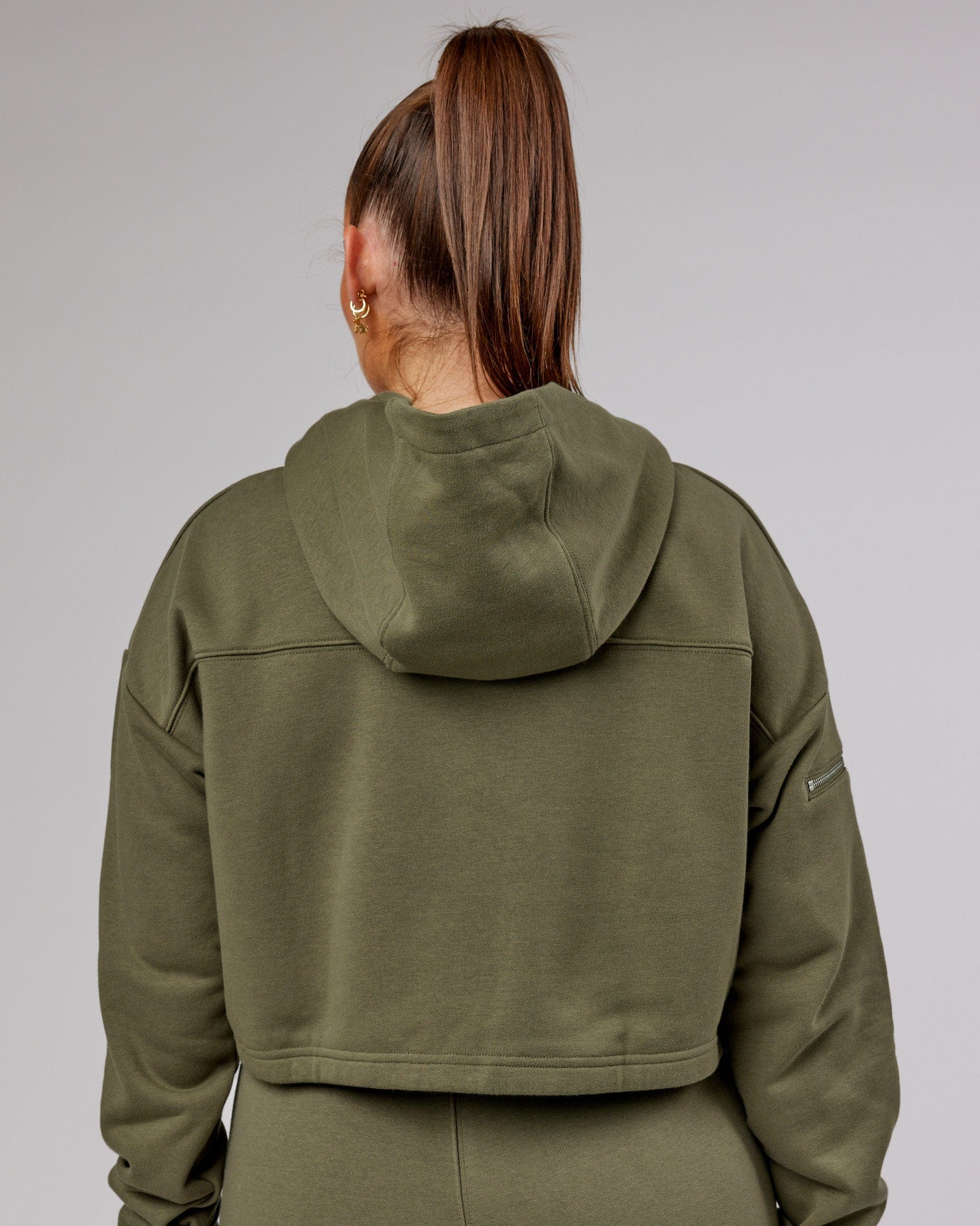 Model wearing Bridge Zip Through Hoodie - Olive Fade