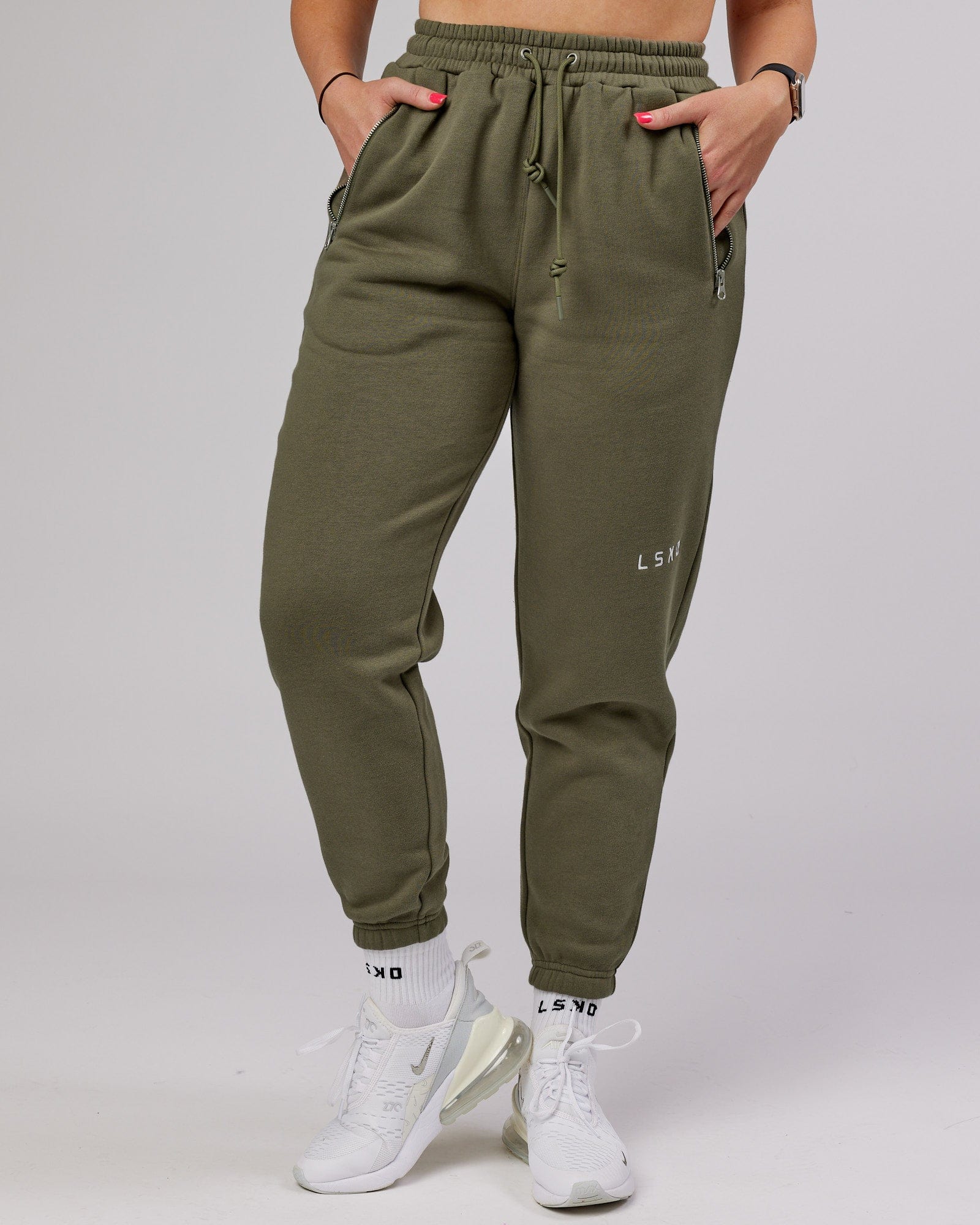 Model wearing Becca Track Pant - Olive Fade