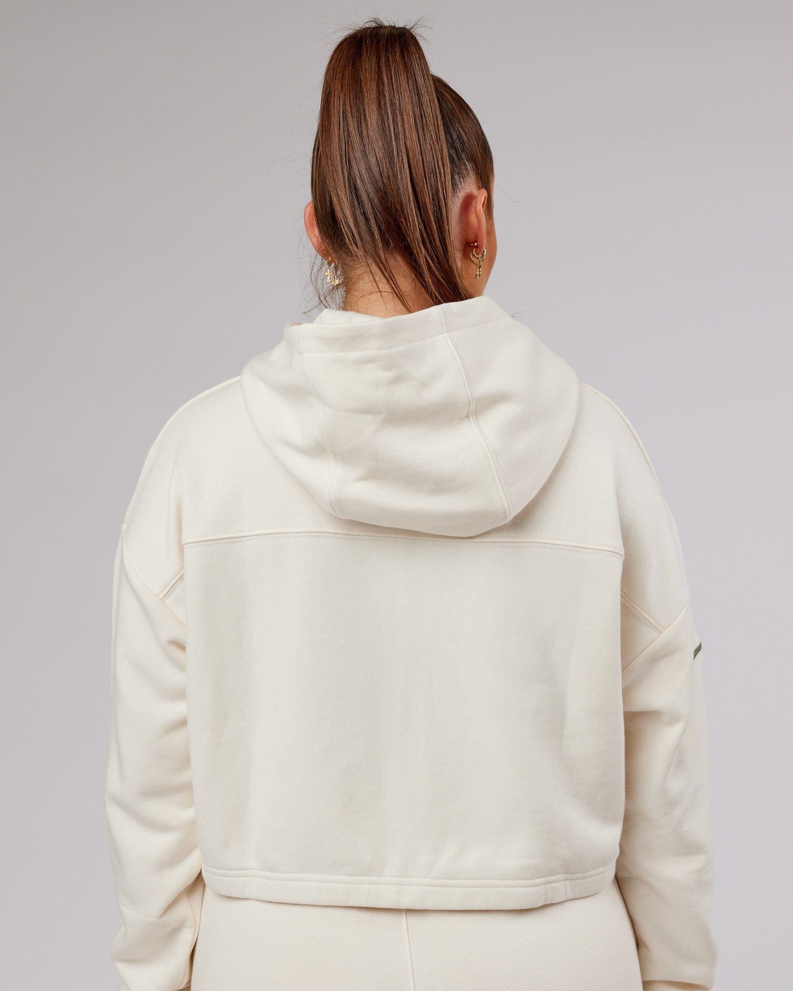 Model wearing Bridge Zip Through Hoodie - Cream