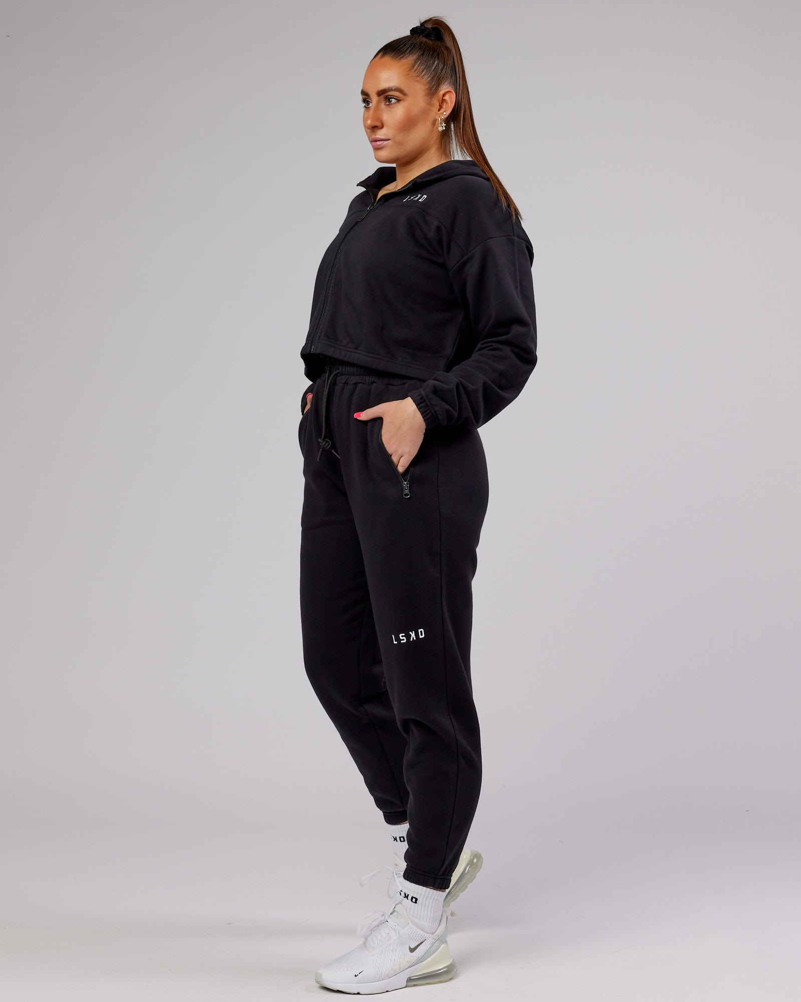 Model wearing Bridge Zip Through Hoodie - Black