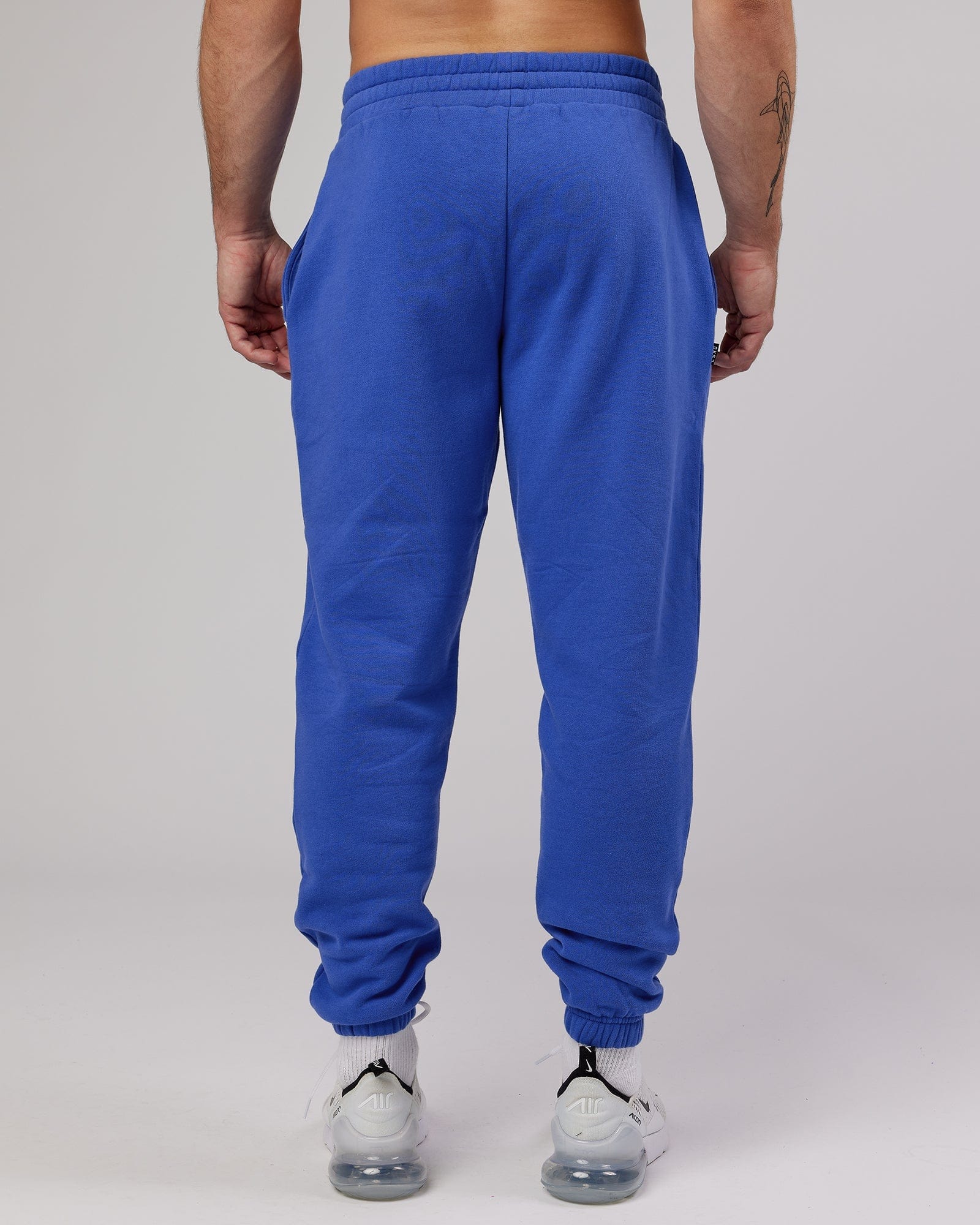 Model wearing Ready Track Pant - Power Cobalt