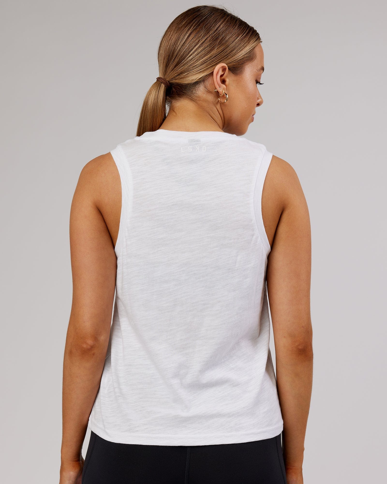 Model wearing Breathe Tank - White