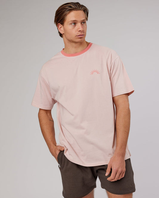 Model wearing Unisex Rise FLXCotton Oversize Tee - Peach Flush