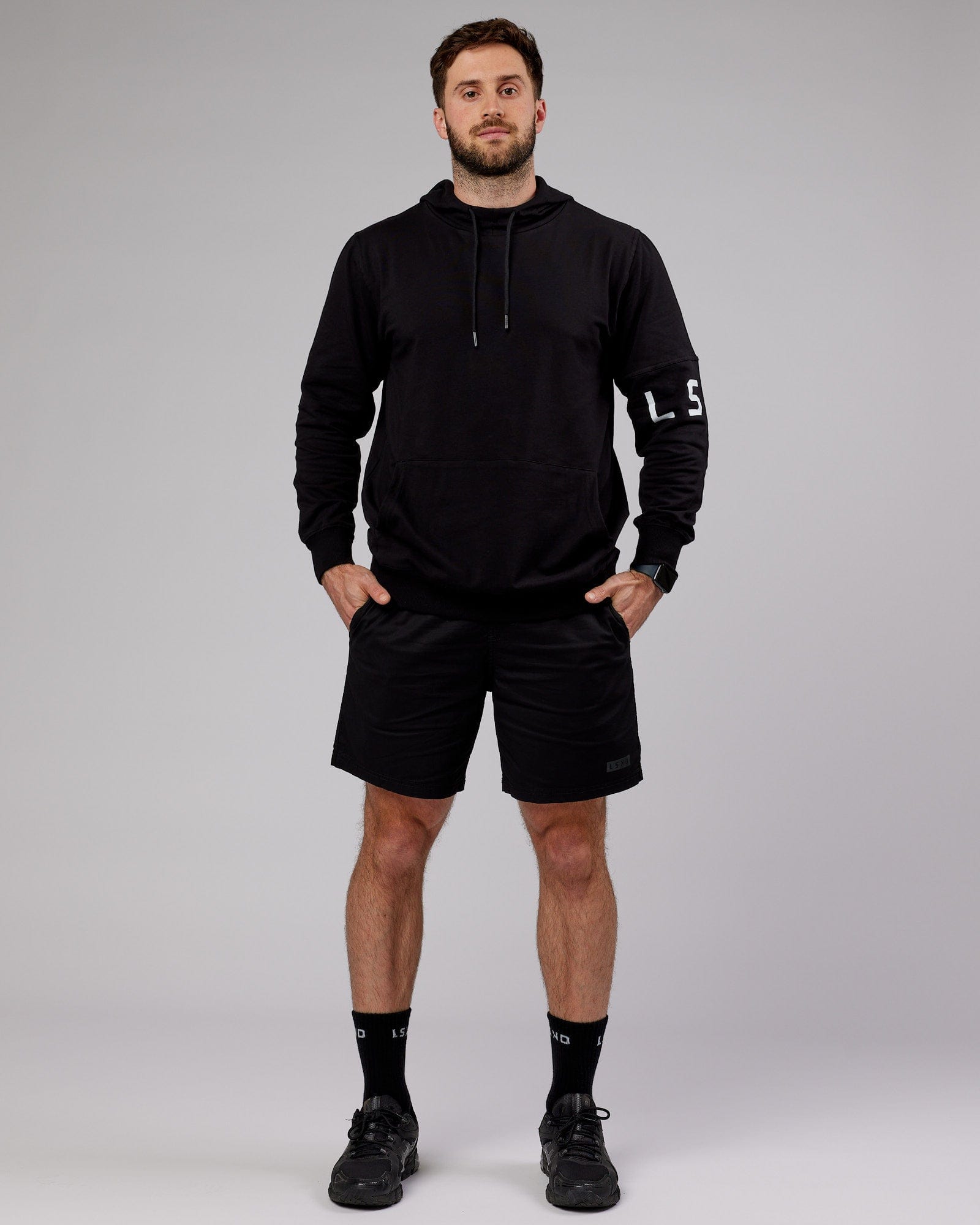 Model wearing Perimeter FLXFleece Hoodie - Black