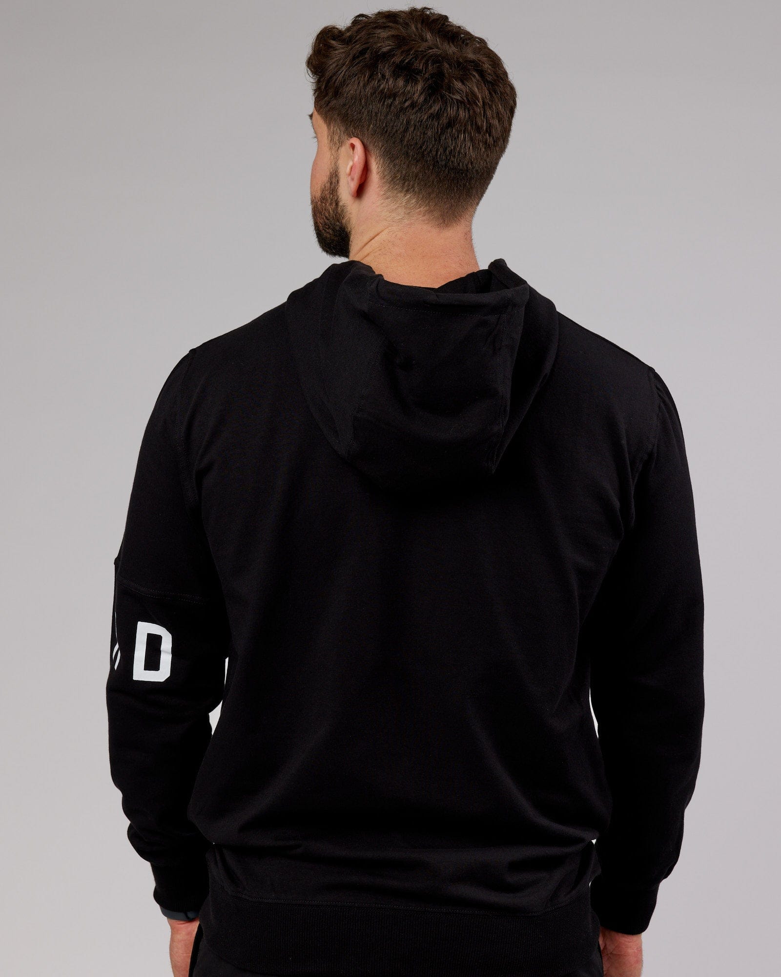 Model wearing Perimeter FLXFleece Hoodie - Black