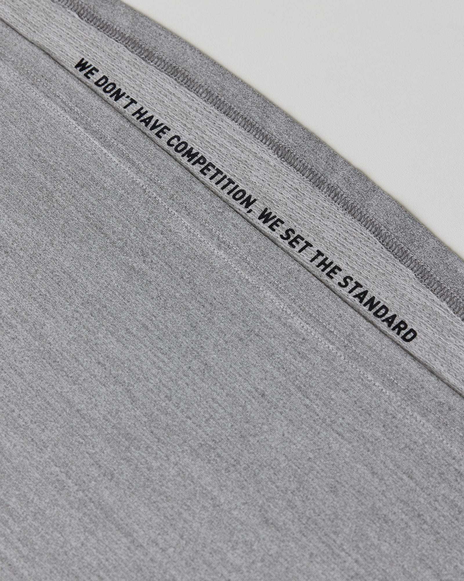 Model wearing Perform VapourFLX Tee - Lt Grey Marl