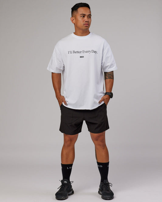 Model wearing 1% Better FLXCotton Tee Oversize - White