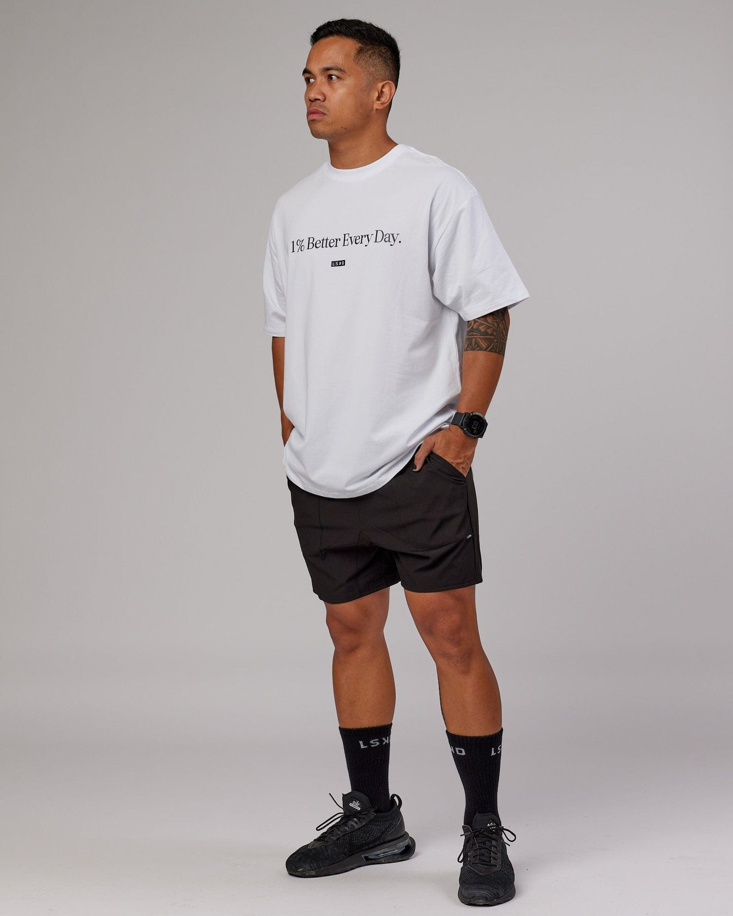 Model wearing 1% Better FLXCotton Tee Oversize - White