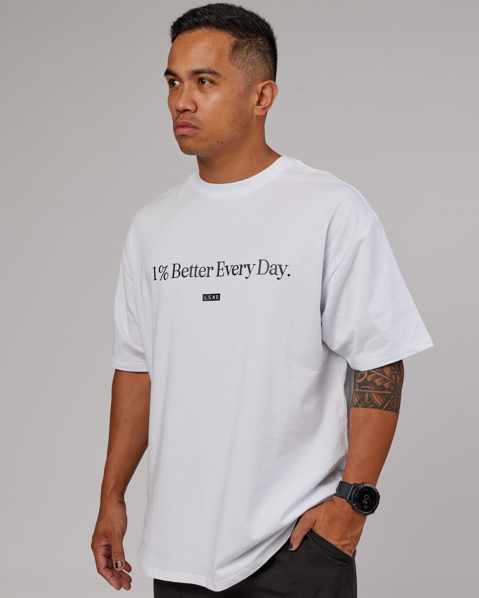 Model wearing 1% Better FLXCotton Tee Oversize - White