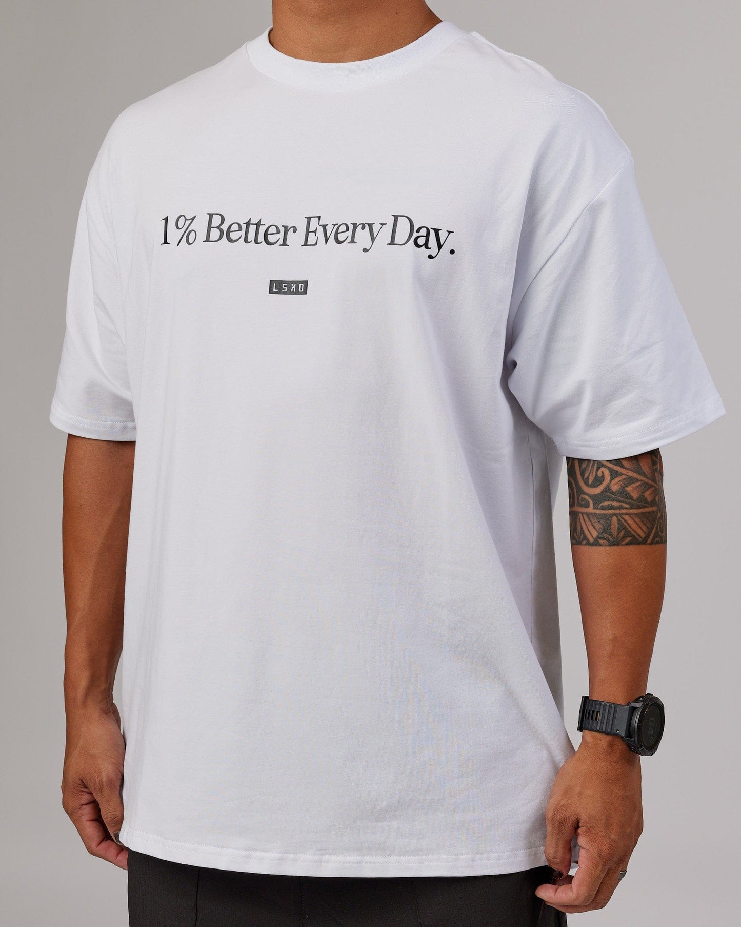 Model wearing 1% Better FLXCotton Tee Oversize - White