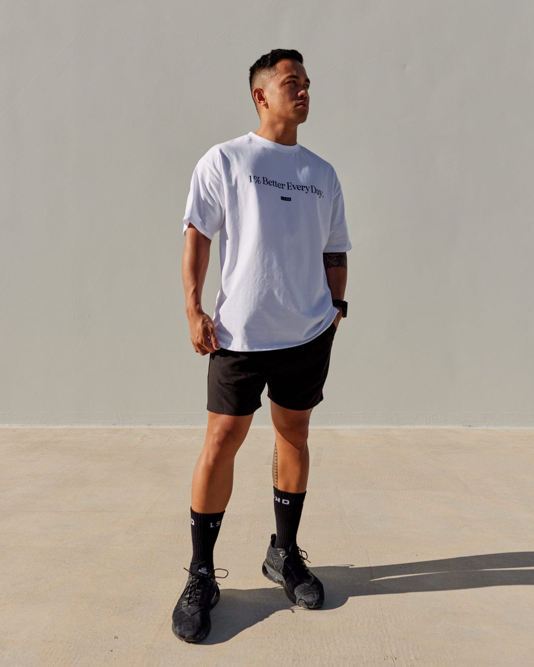 Model wearing 1% Better FLXCotton Tee Oversize - White