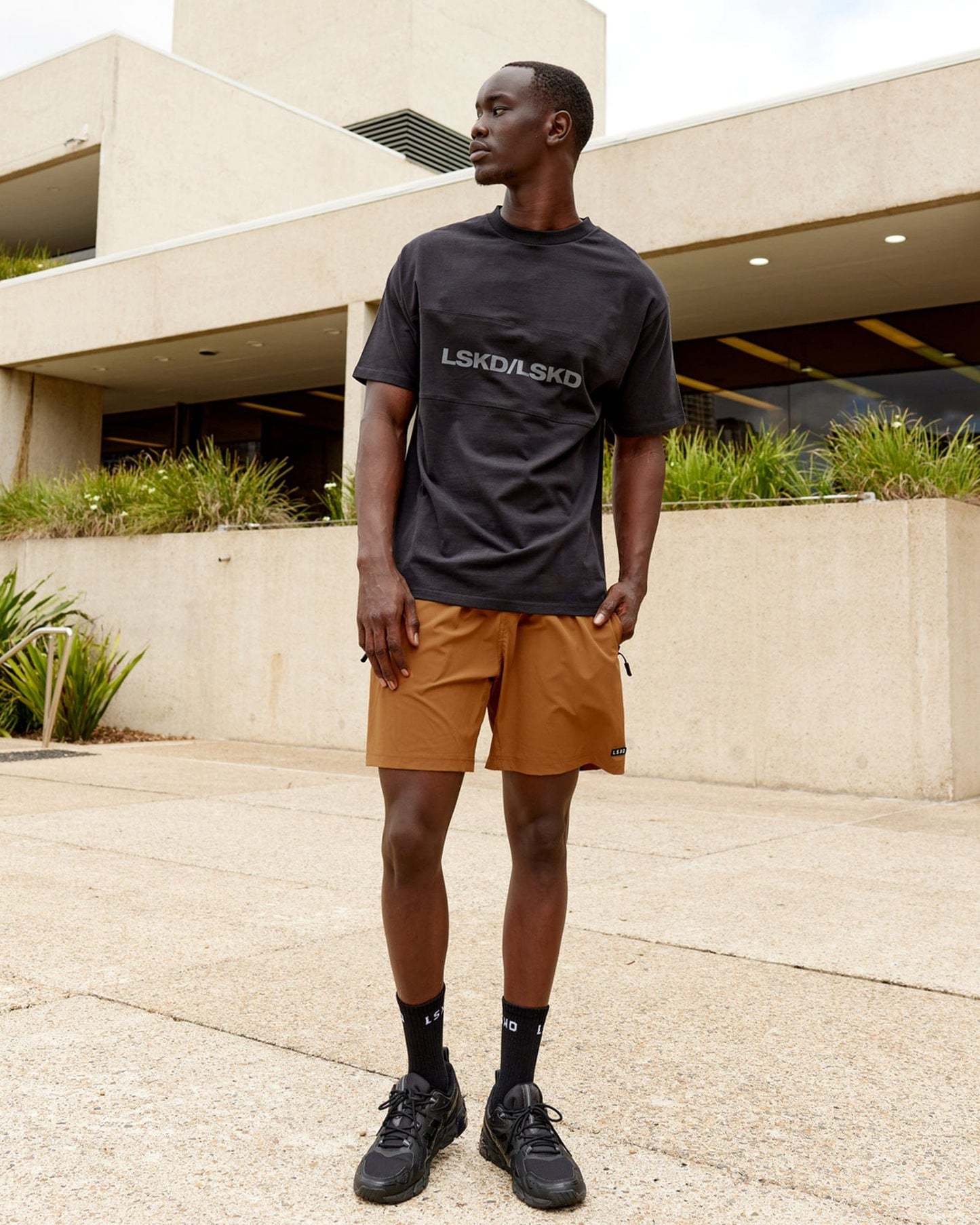 Model wearing Impact Heavyweight Tee Oversize - Black-Grey