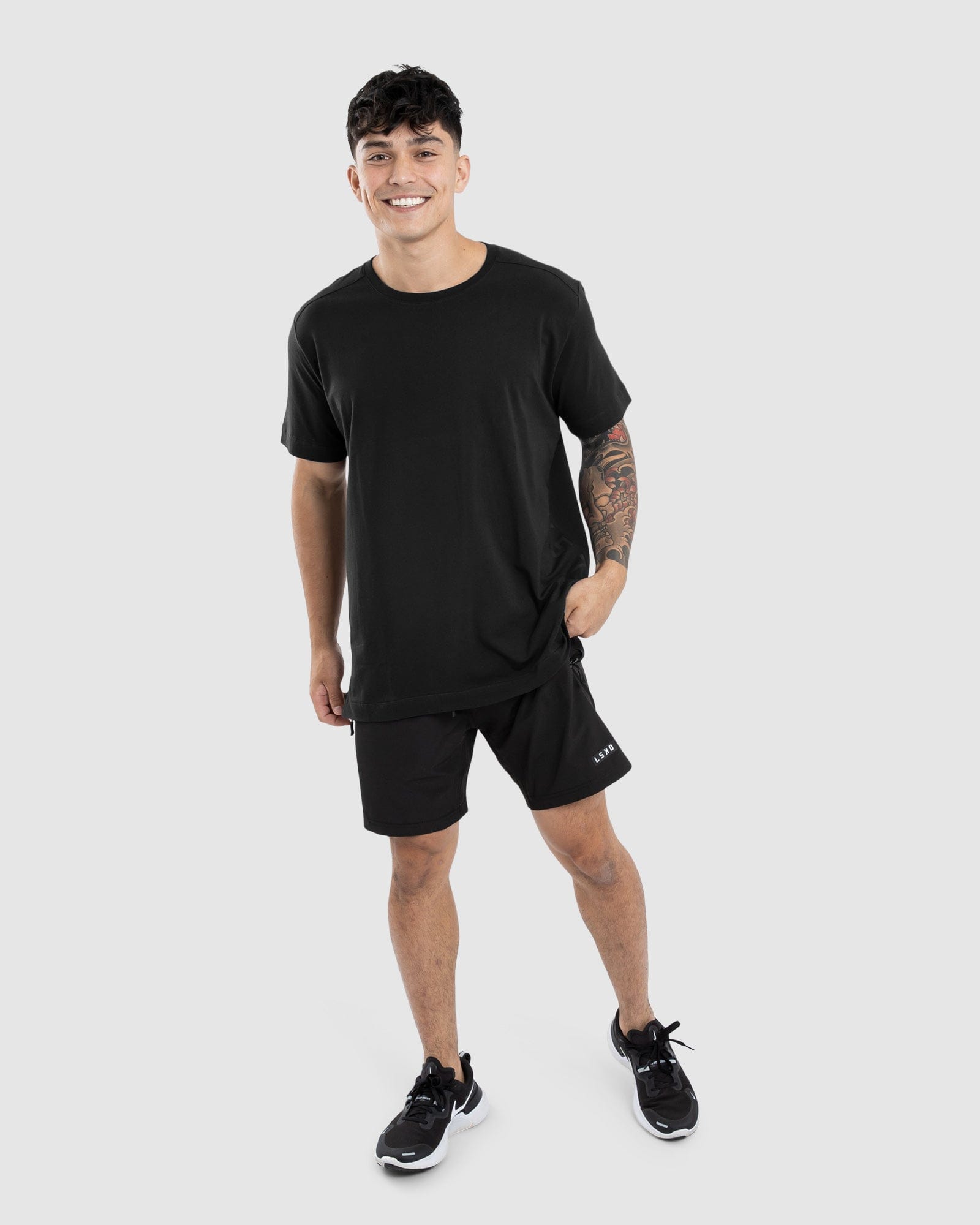 Model wearing Flex Tee - Black-Black