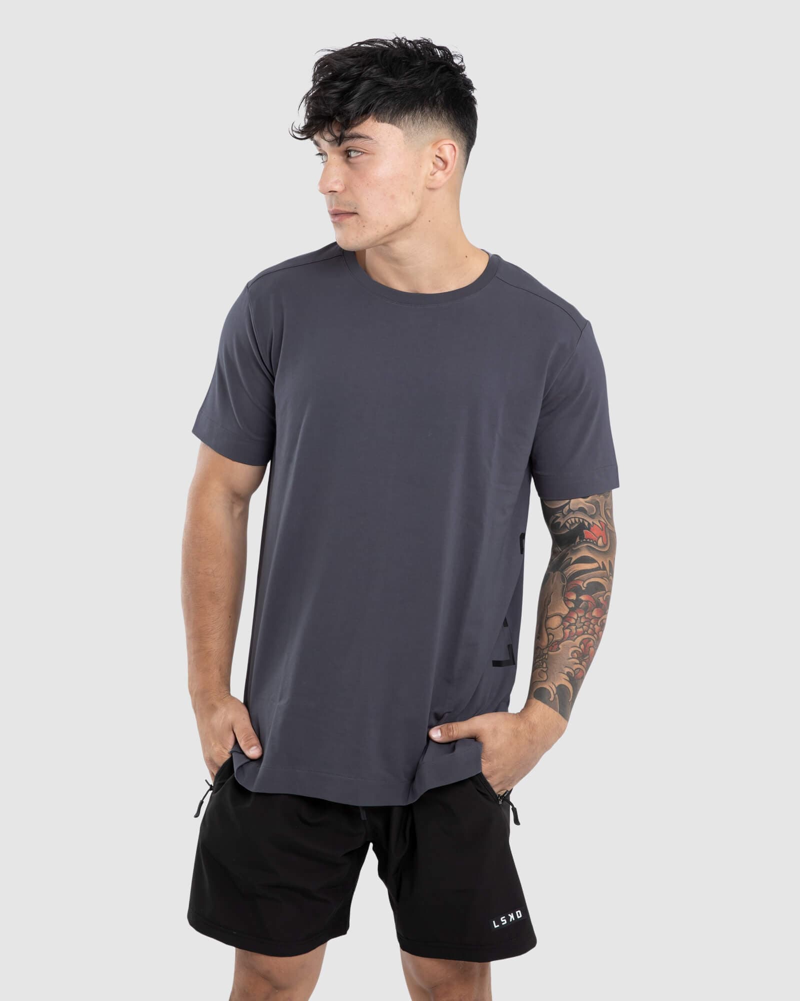 Model wearing Flex Tee - Iron