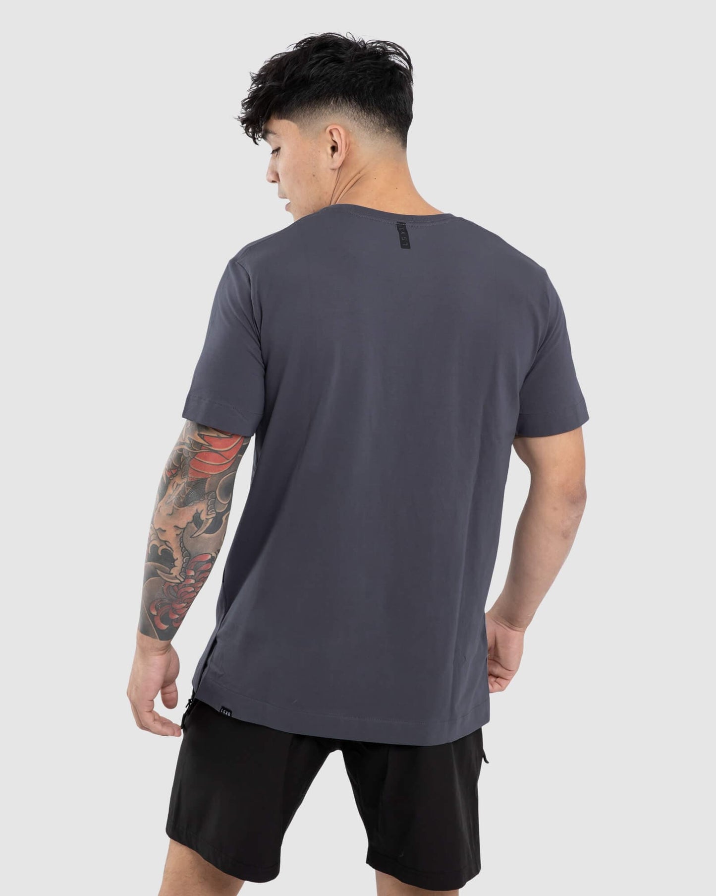 Model wearing Flex Tee - Iron
