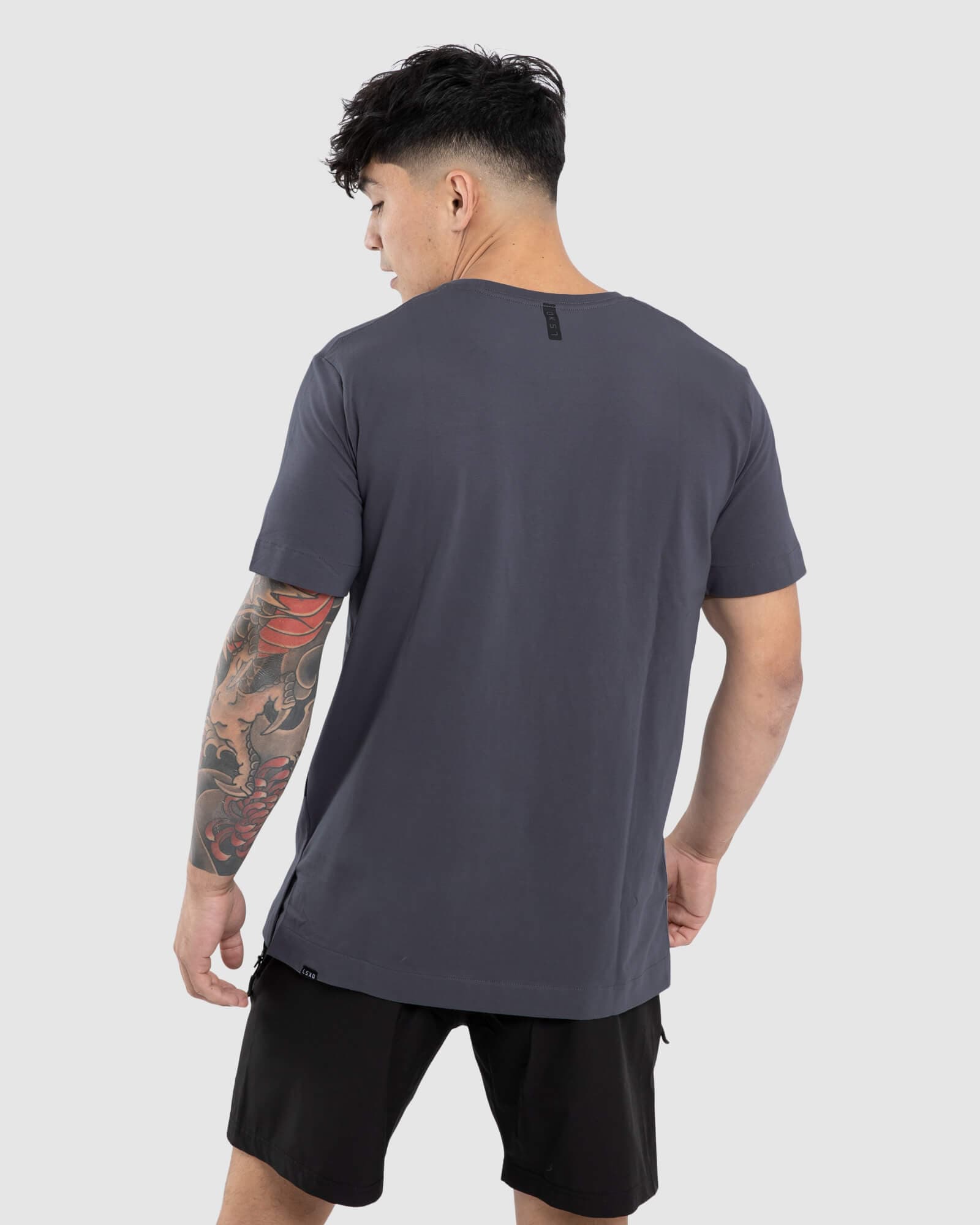 Model wearing Flex Tee - Iron