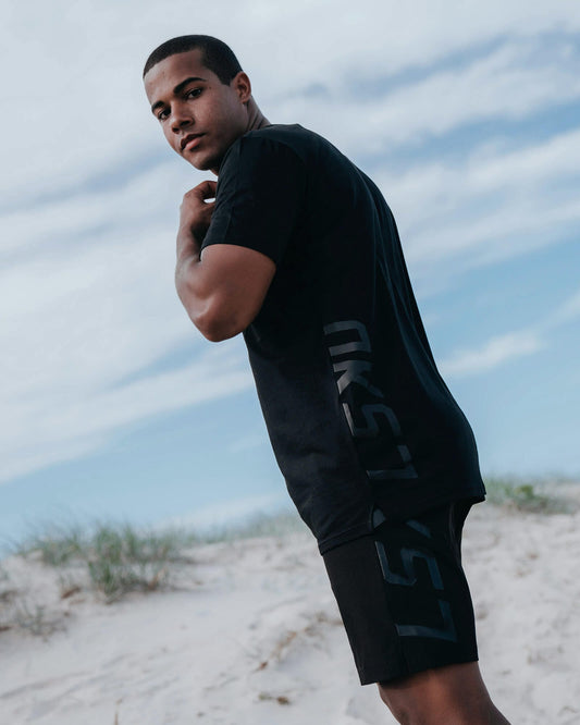 Model wearing Faction Tee - Black-Black