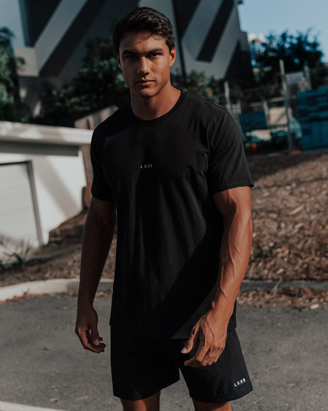 Model wearing Base Tee - Black