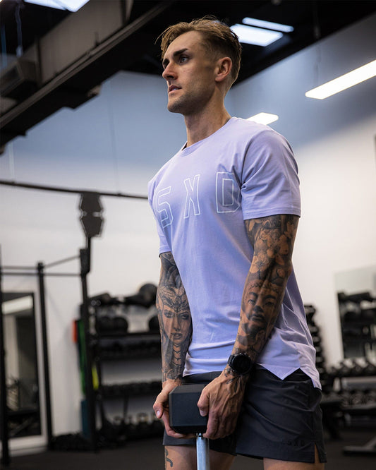 Model wearing Expand FLXCotton Tee - Cosmic Sky