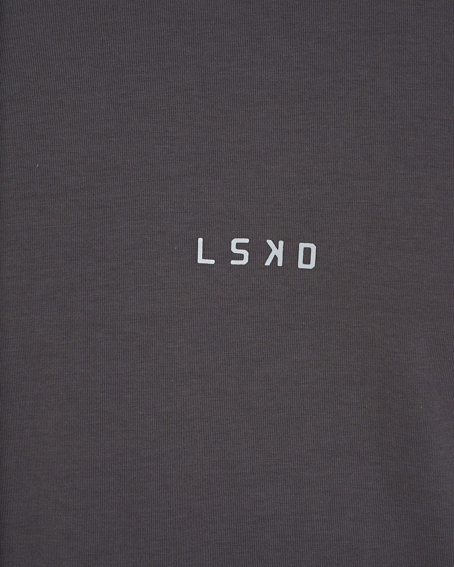 Model wearing Base Tee - Shadow