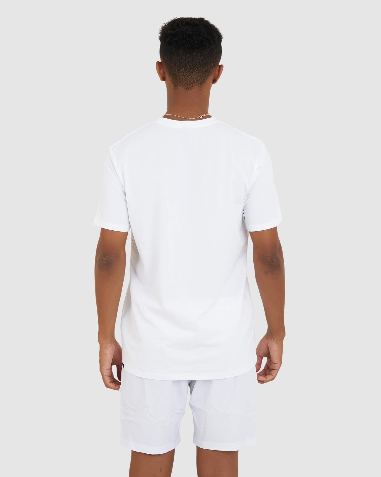 Model wearing Base Tee - White