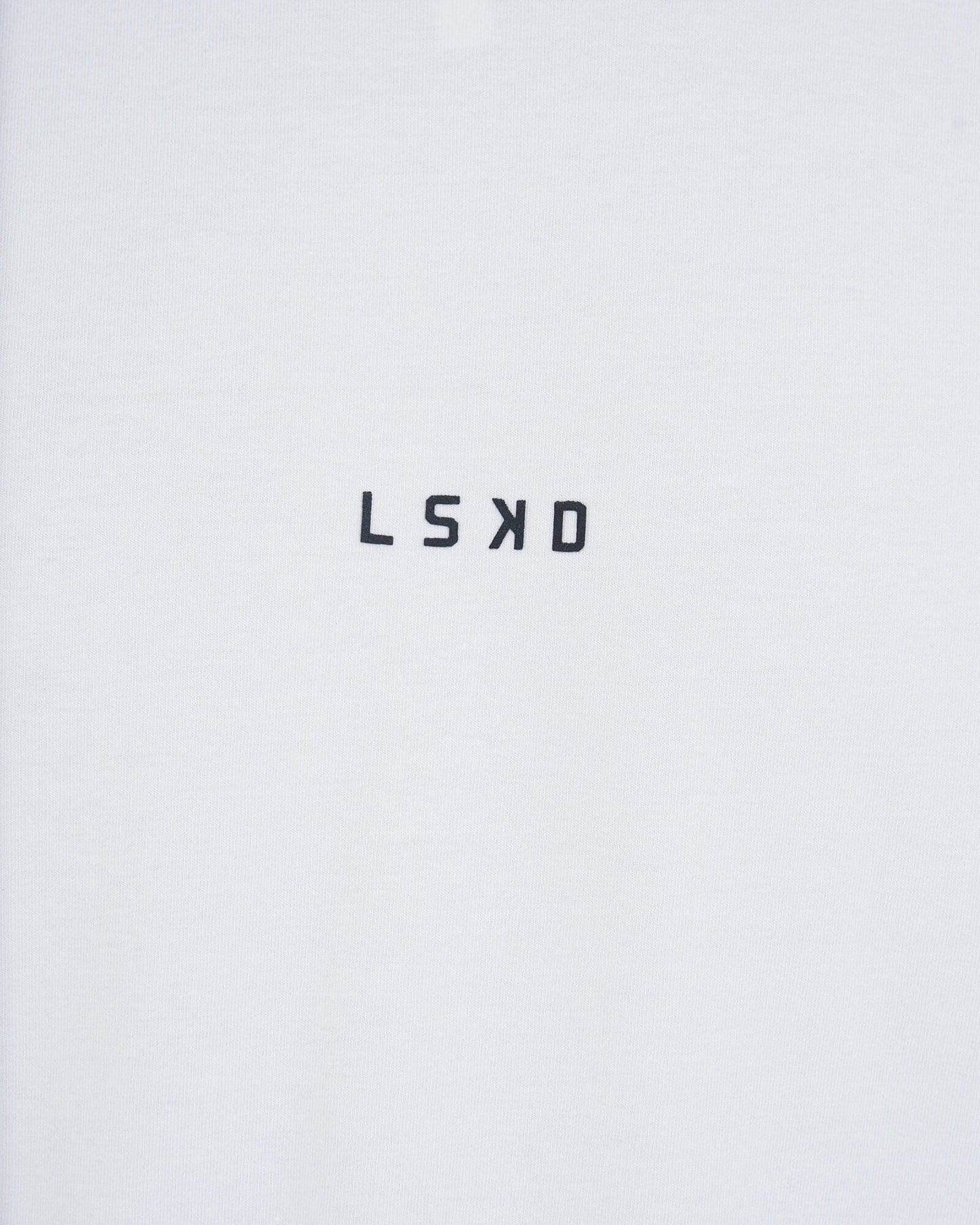 Model wearing Base Tee - White