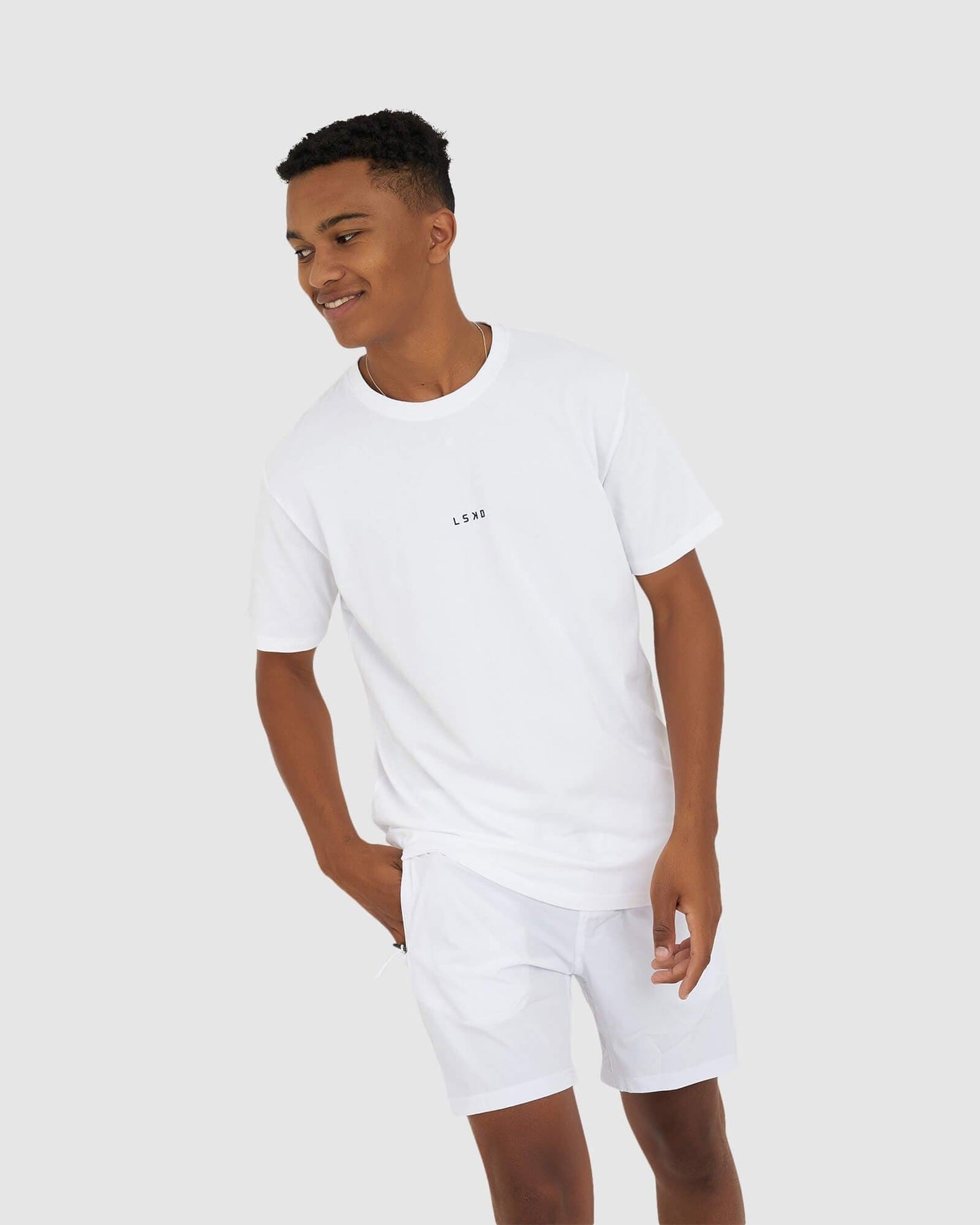 Model wearing Base Tee - White