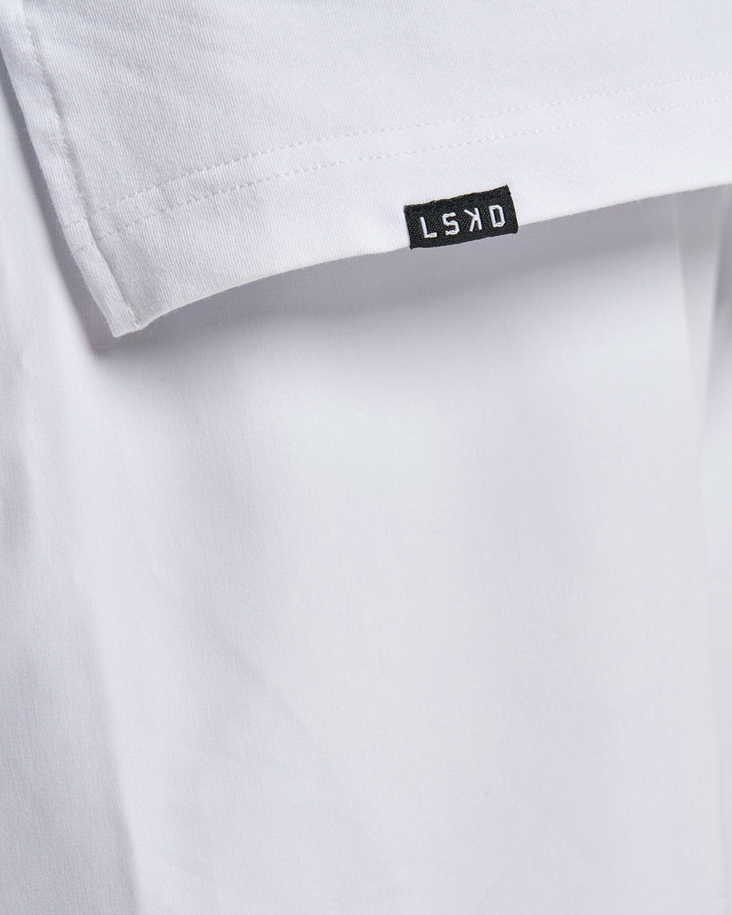 Model wearing LSKD x LM Tee - White