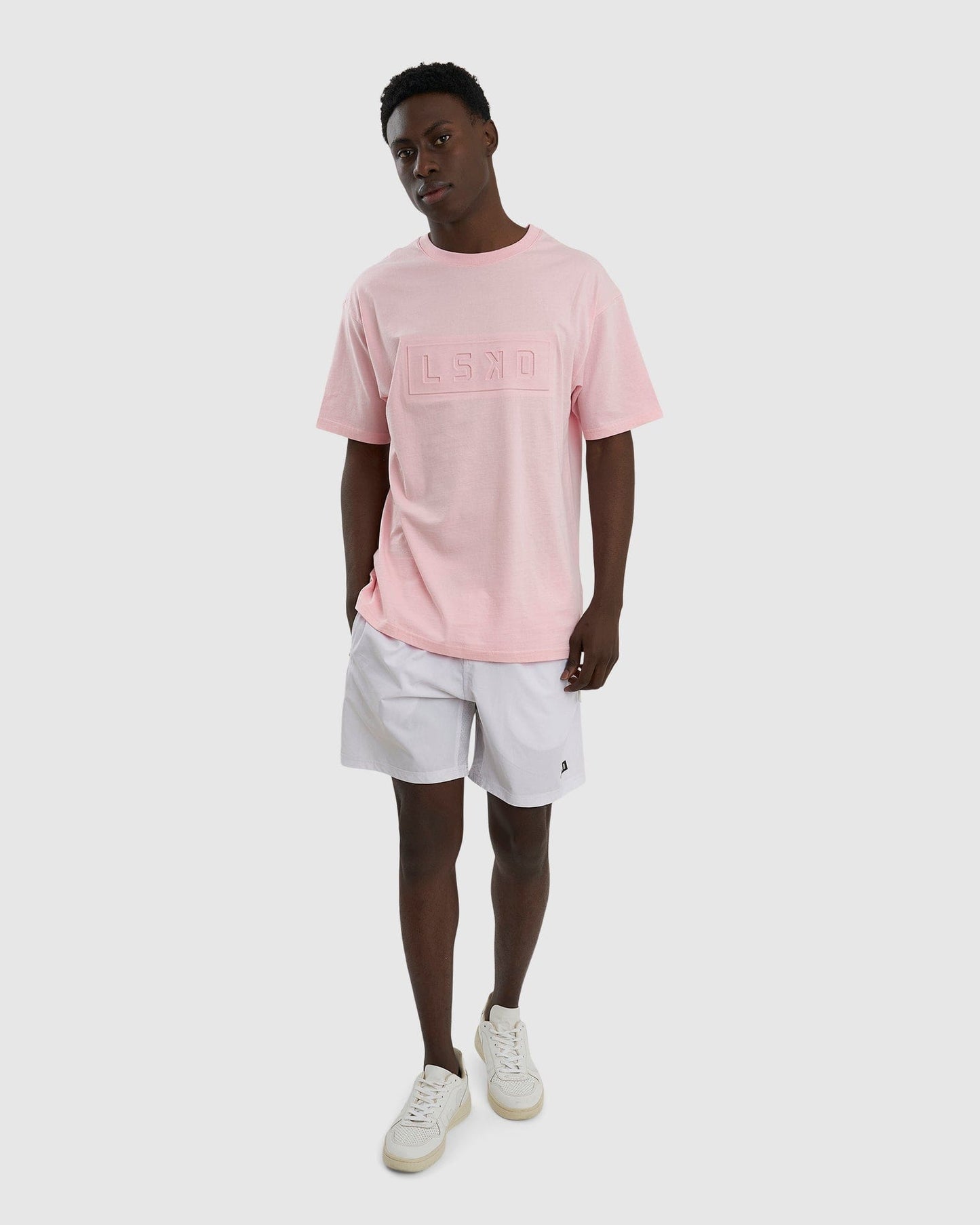 Model wearing Imprint Tee Oversize - Petal Pink