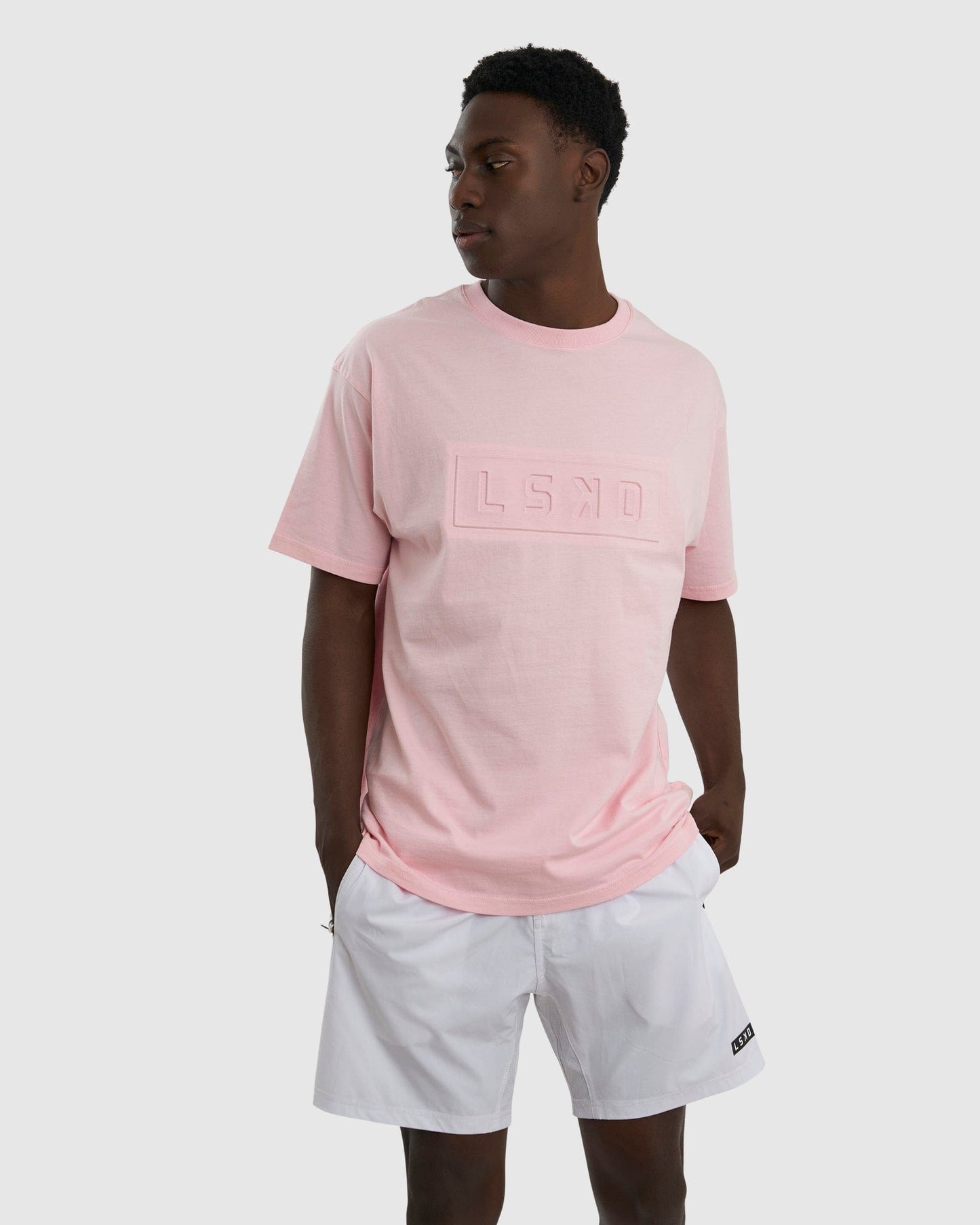 Model wearing Imprint Tee Oversize - Petal Pink