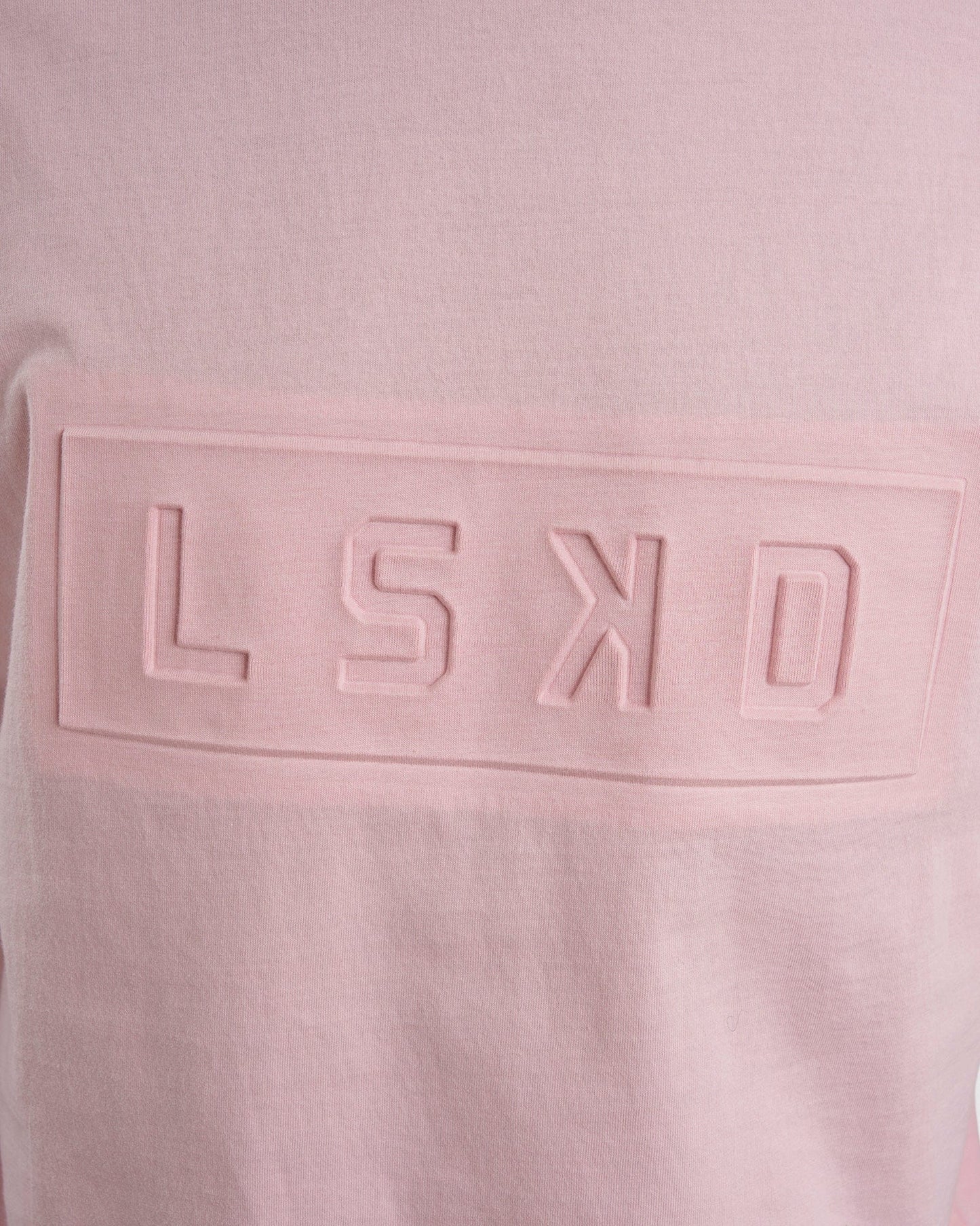 Model wearing Imprint Tee Oversize - Petal Pink