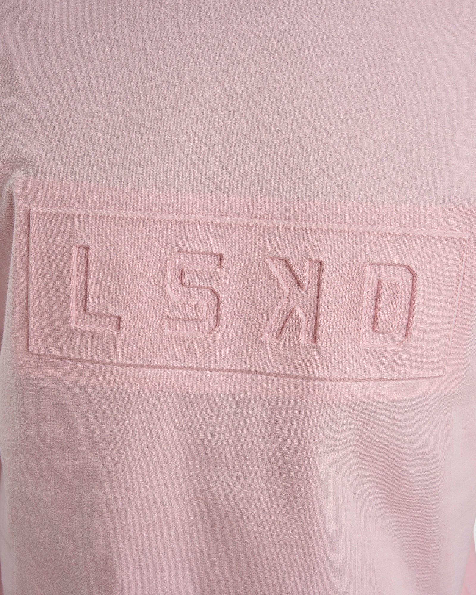 Model wearing Imprint Tee Oversize - Petal Pink