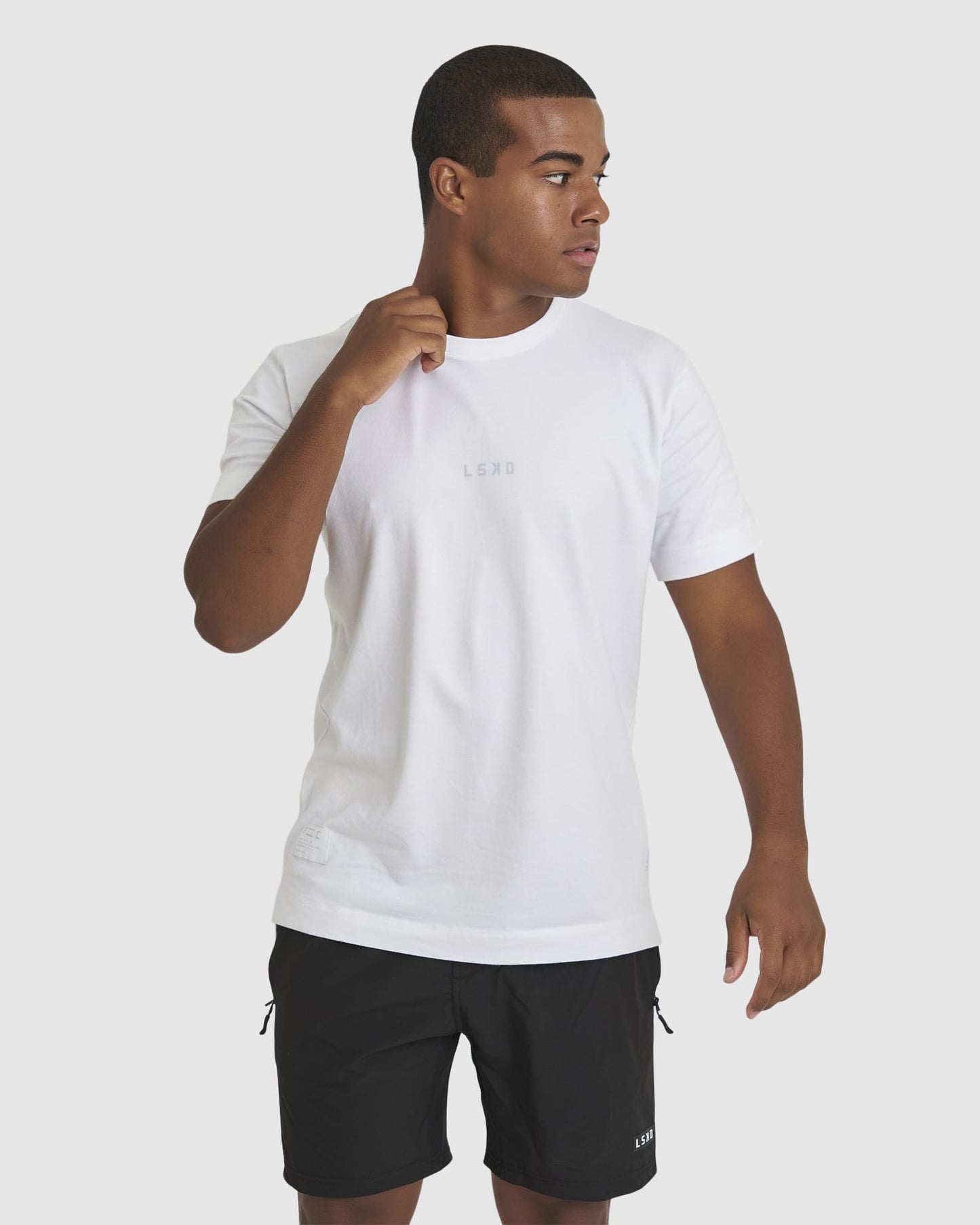 Model wearing Run Club FLXDRY Performance Tee - White-Reflective