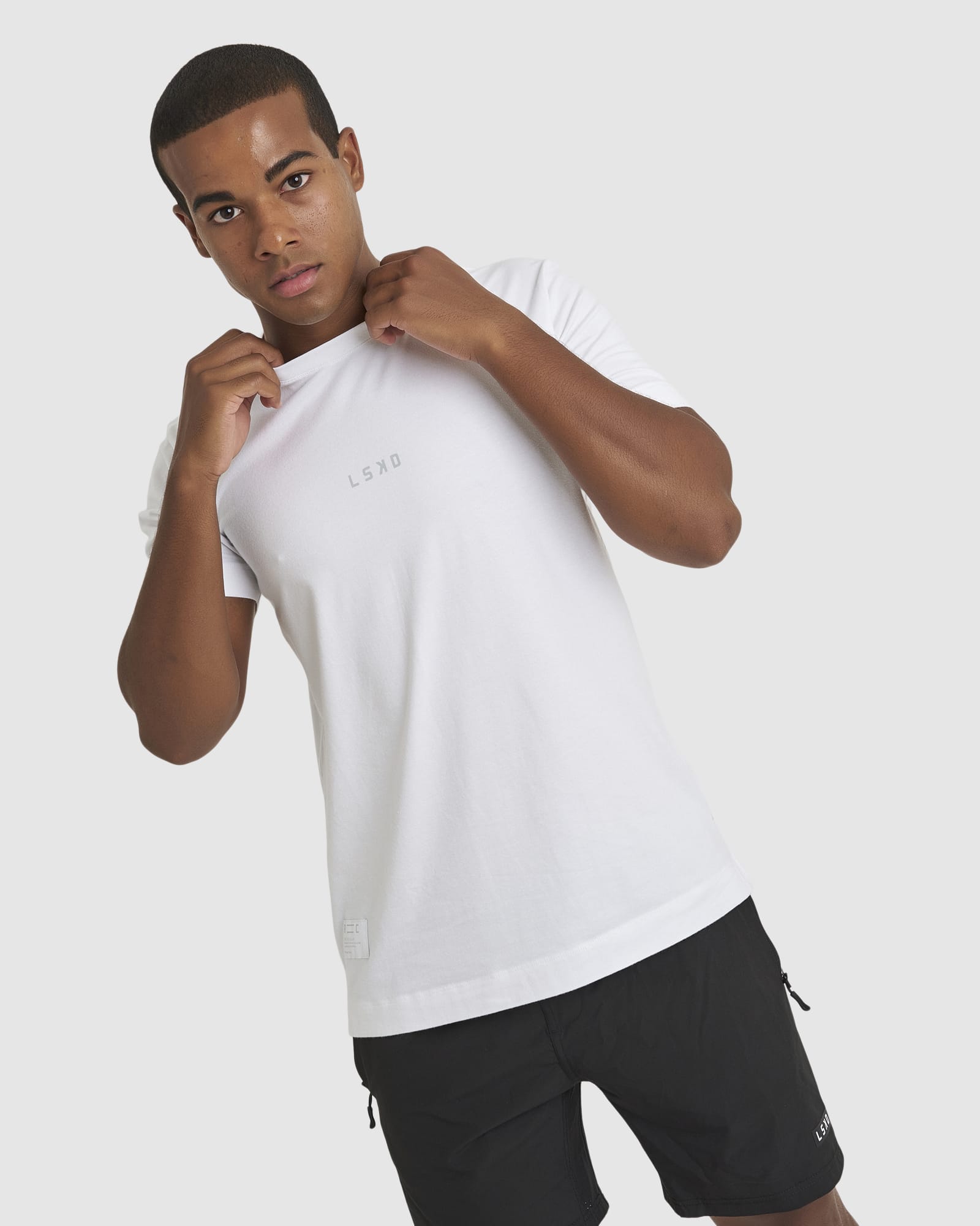 Model wearing Run Club FLXDRY Performance Tee - White-Reflective