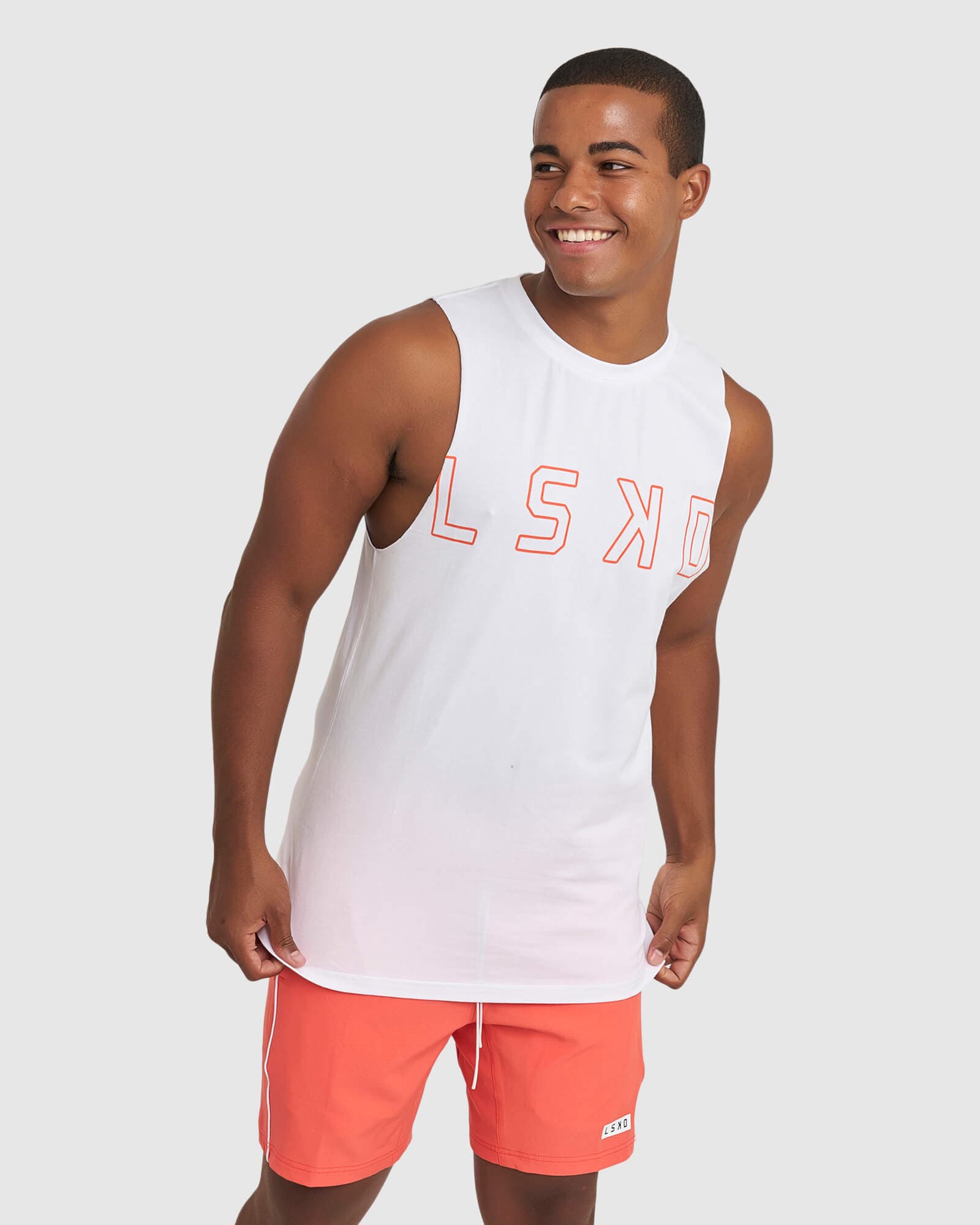 Model wearing Expand FLXCotton Training Fit Tank - White-Fruit Punch