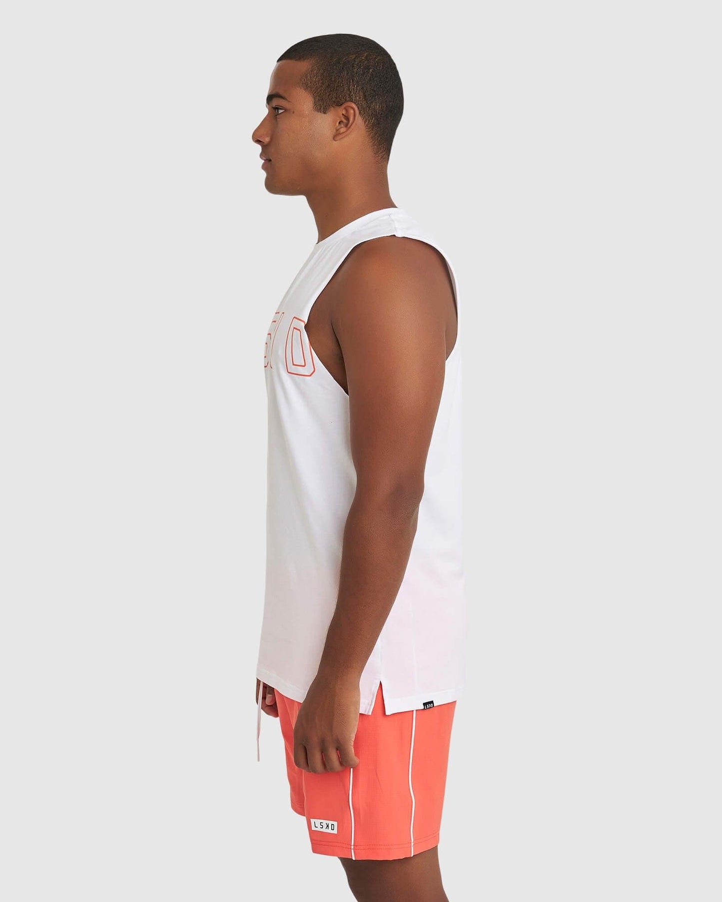 Model wearing Expand FLXCotton Training Fit Tank - White-Fruit Punch