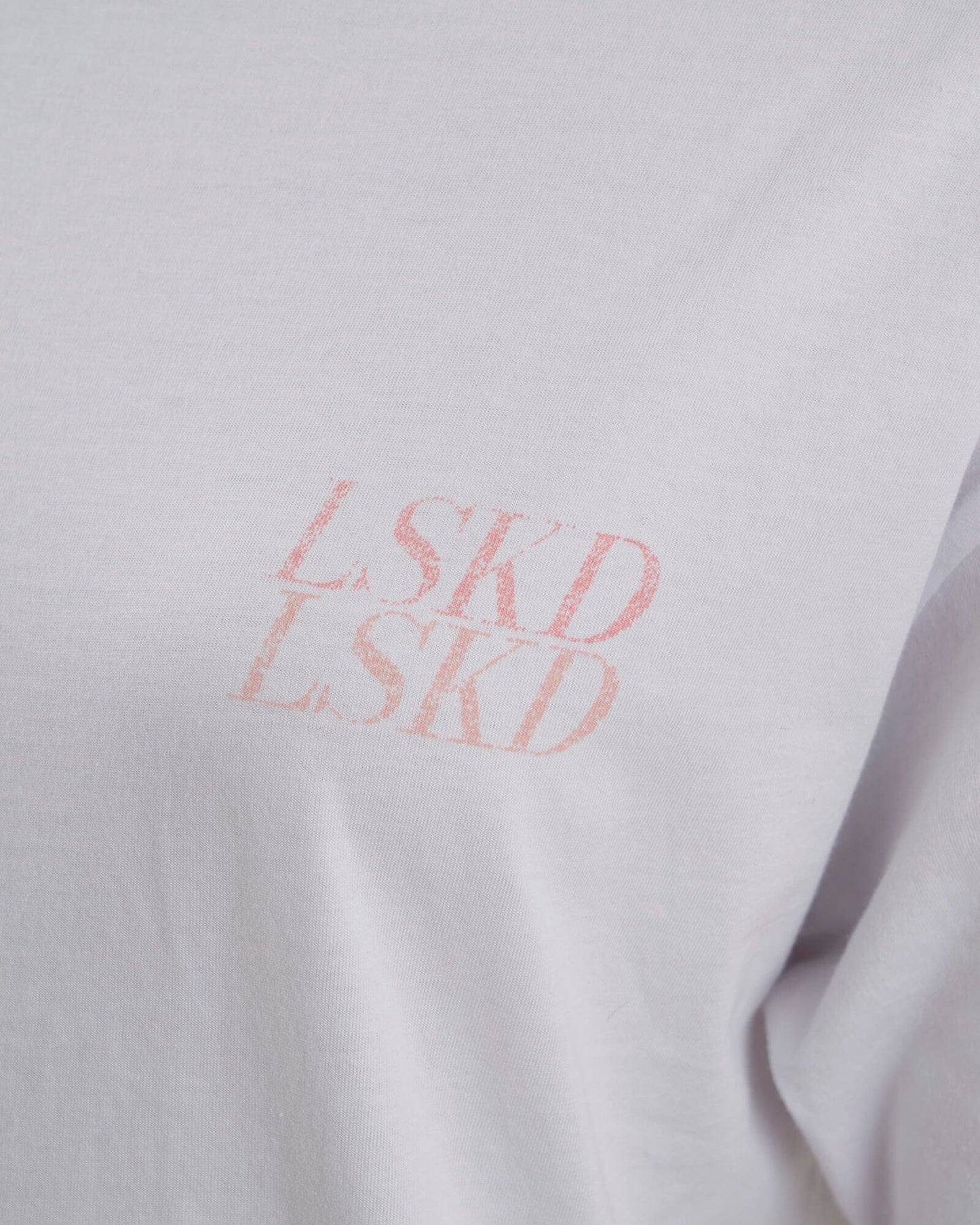 Model wearing Aurora Tee Oversized - White