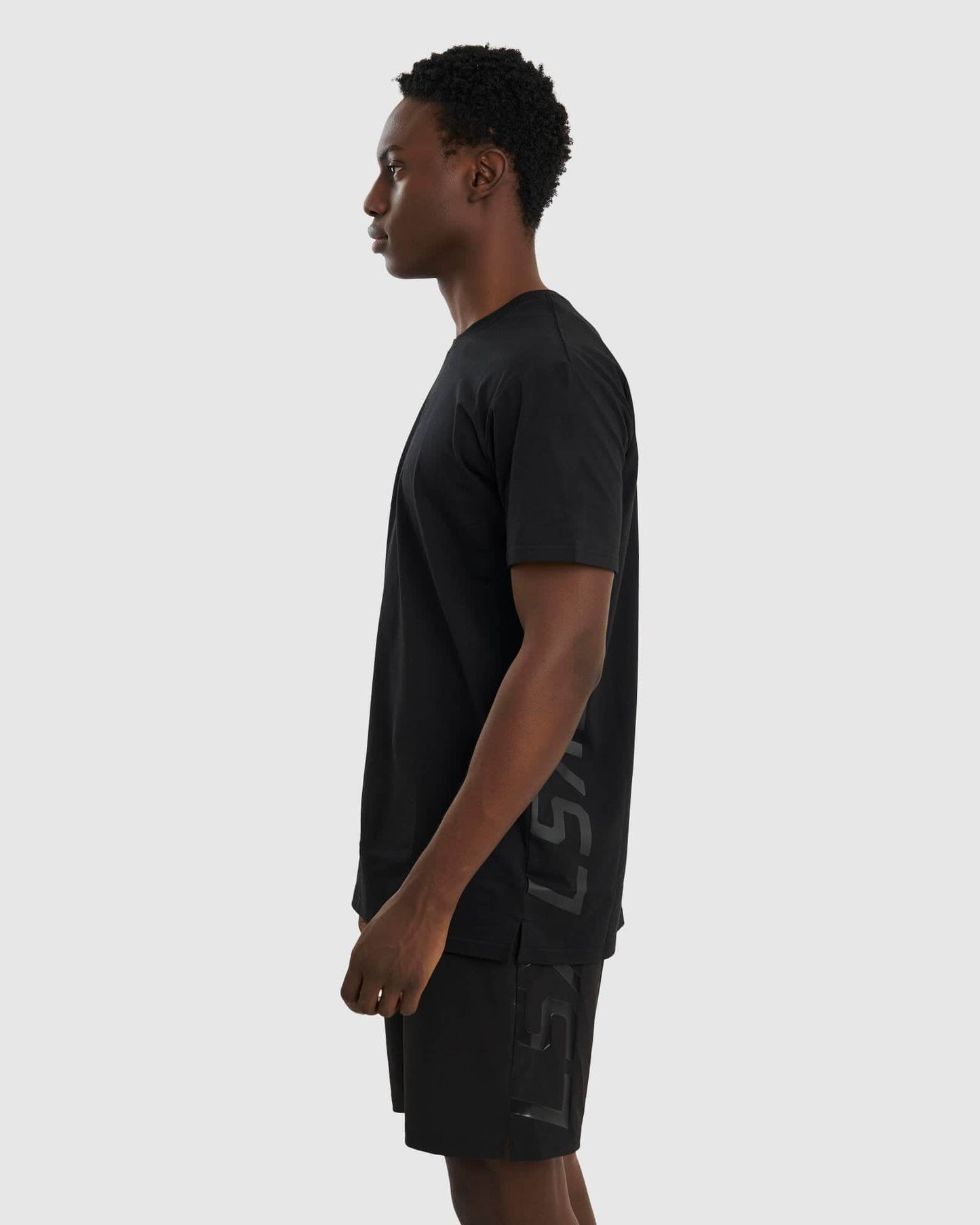 Model wearing Faction Tee - Black-Black