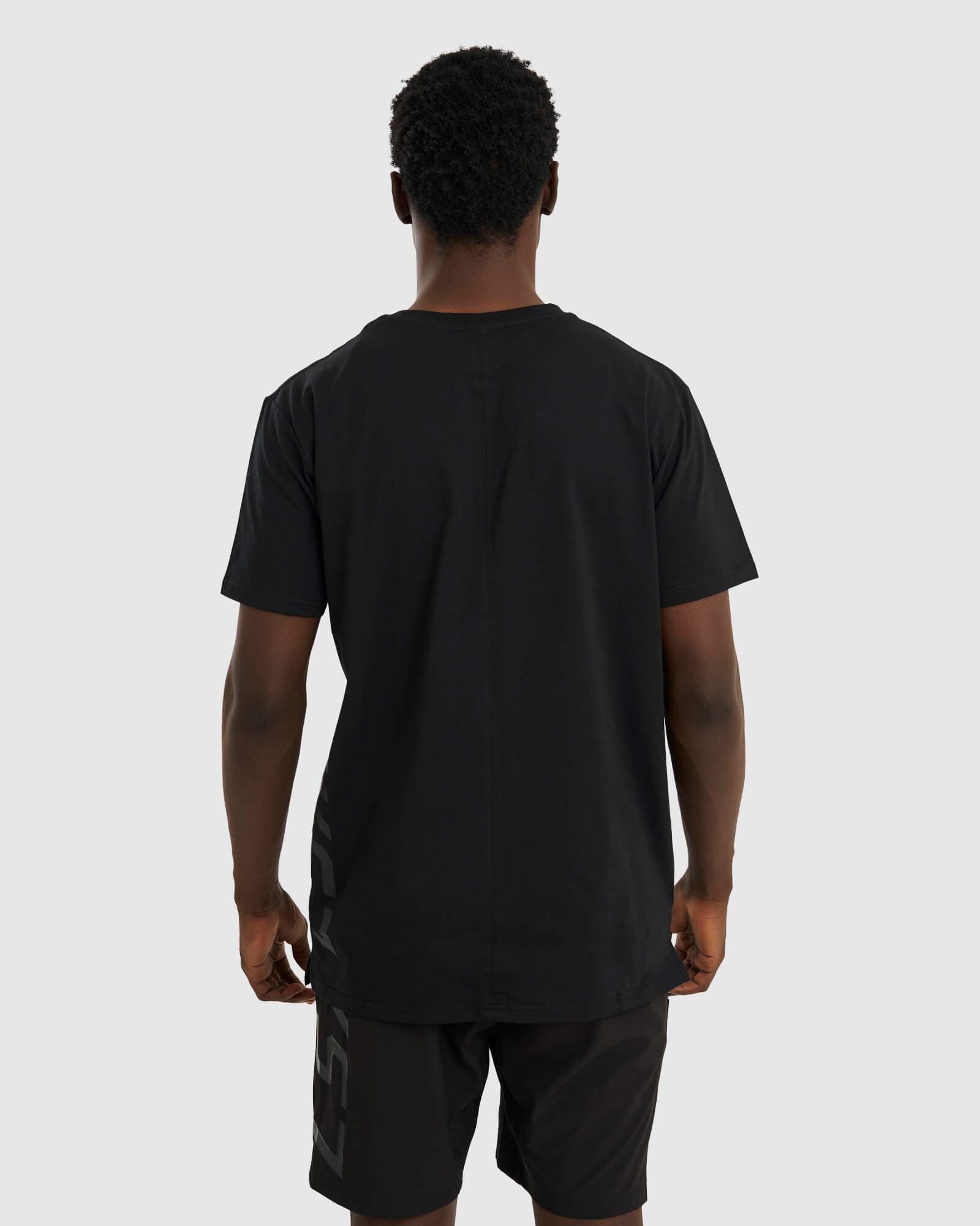 Model wearing Faction Tee - Black-Black