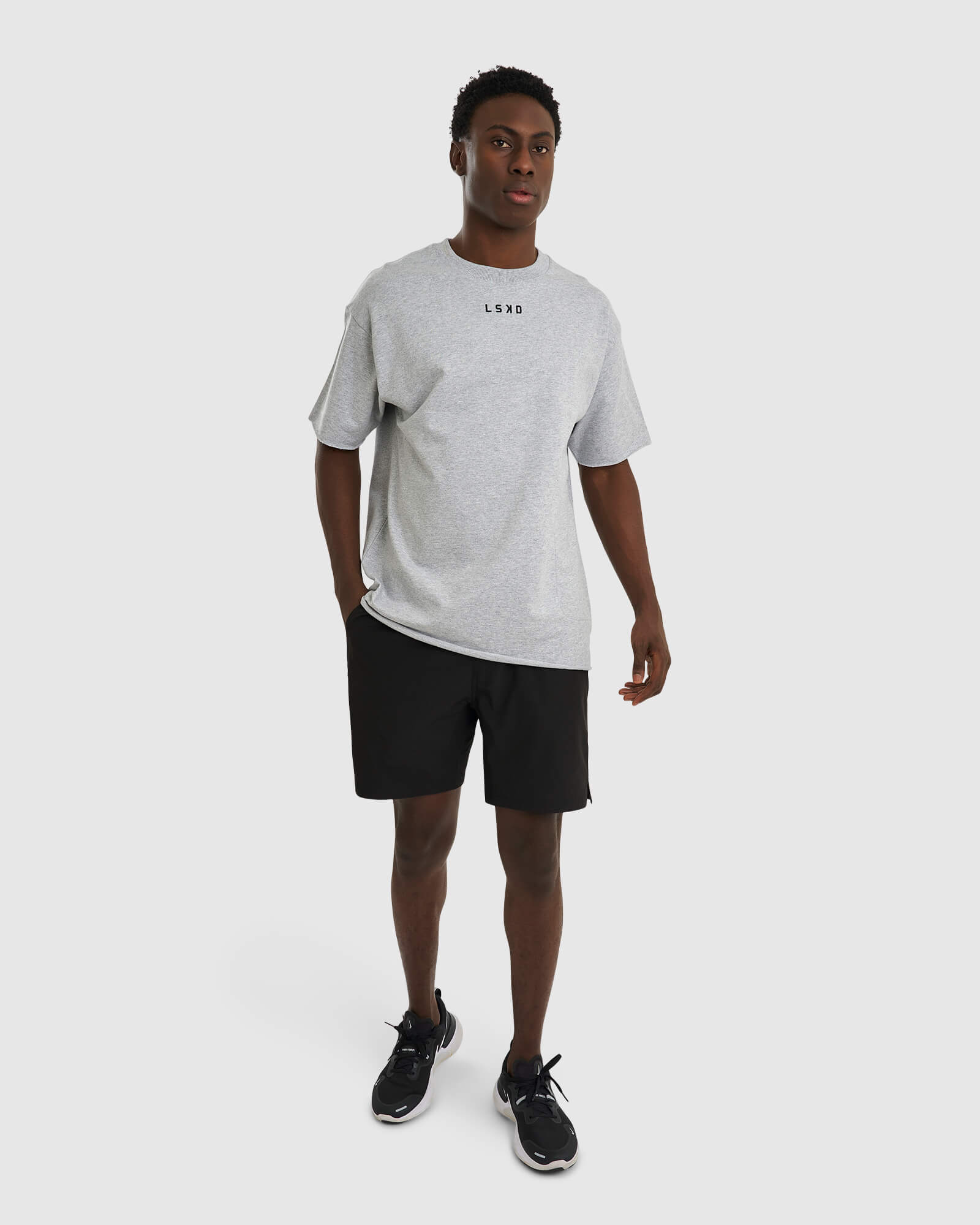 Model wearing Lift Heavyweight Tee Oversize - Lt Grey Marl