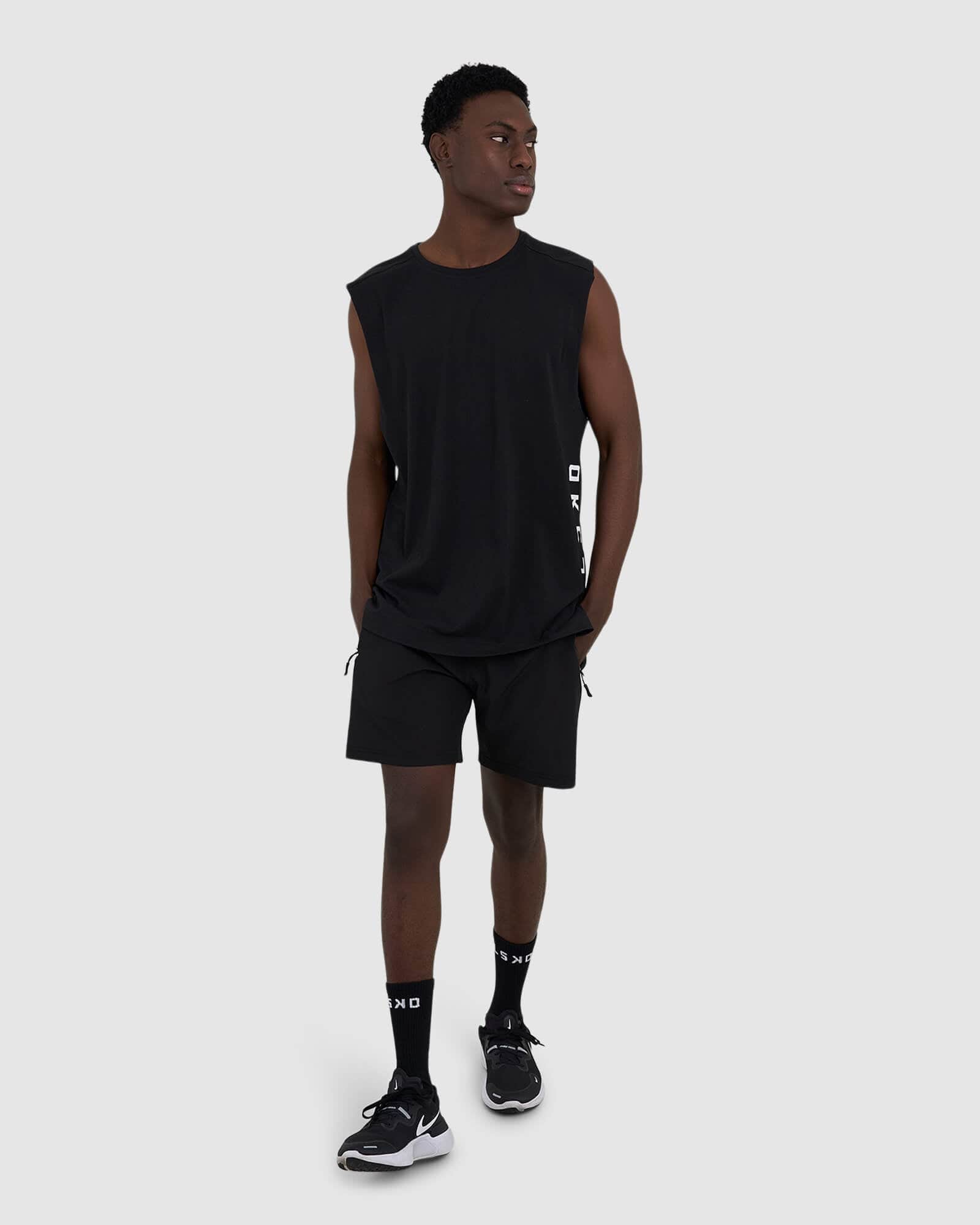 Model wearing Flex Tank - Black-White