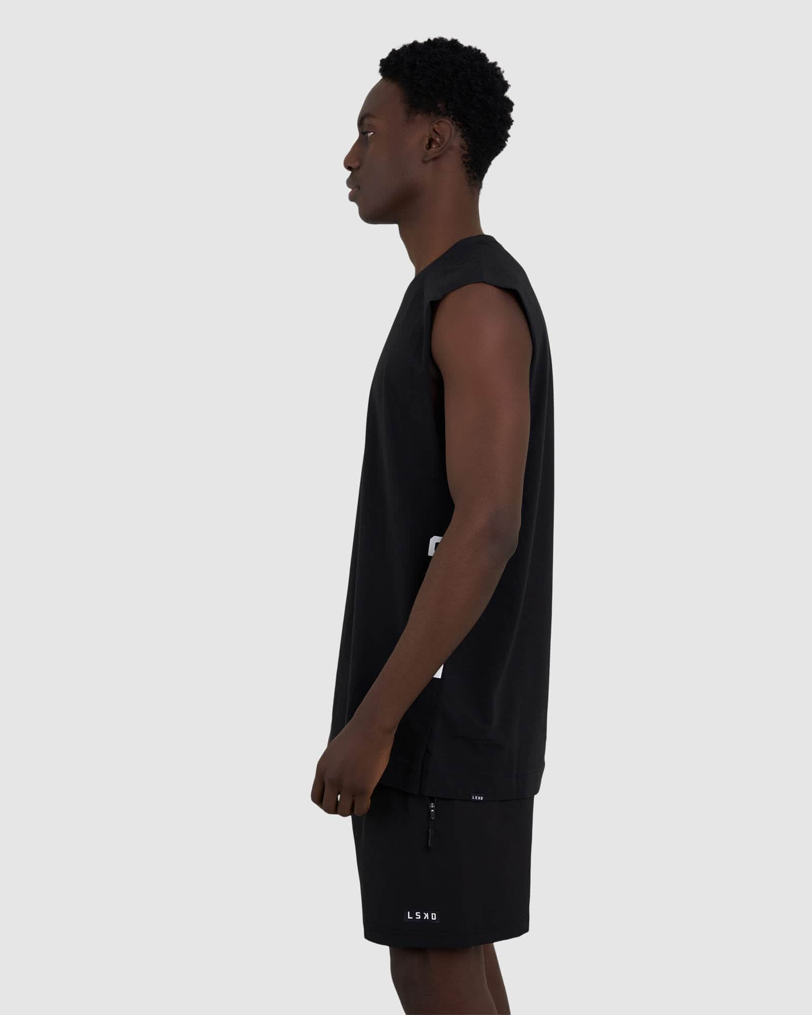 Model wearing Flex Tank - Black-White