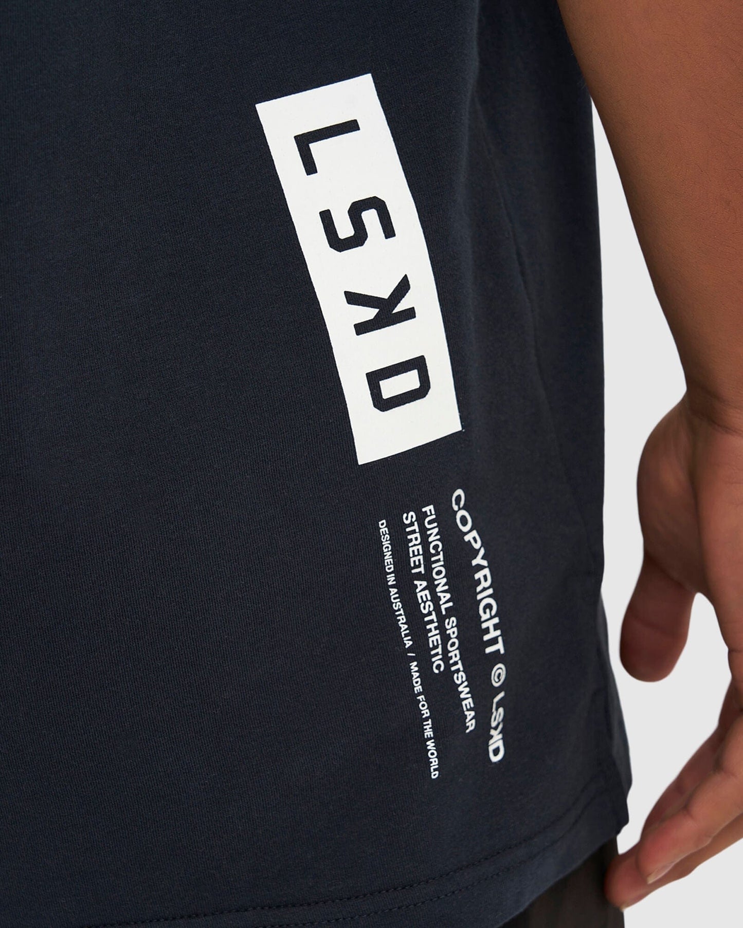 Model wearing Form Tee - Carbon