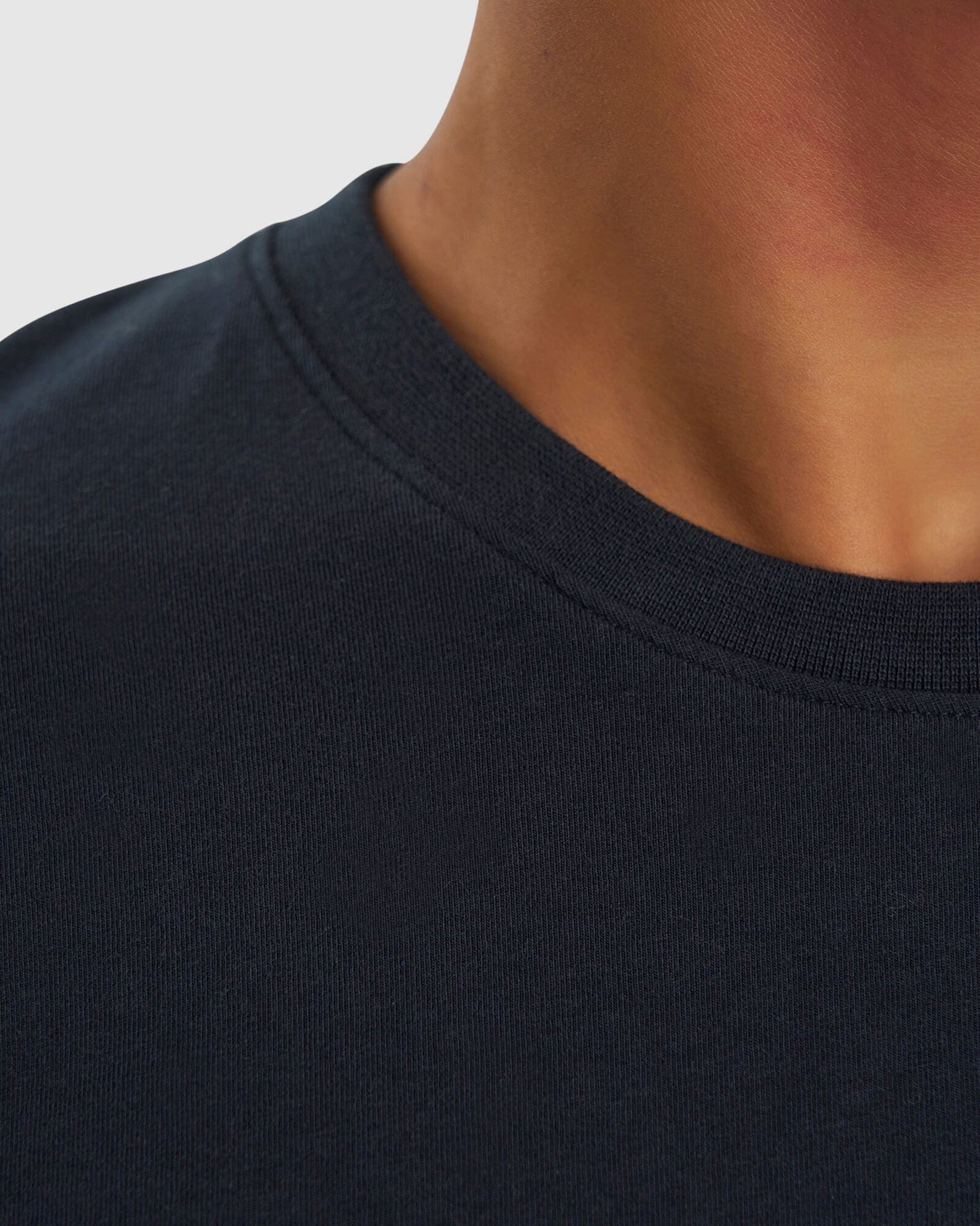 Model wearing Form Tee - Carbon