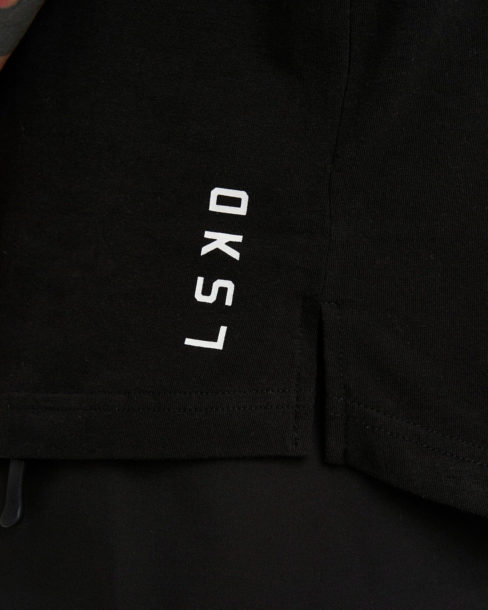 Model wearing Tab Tee - Black